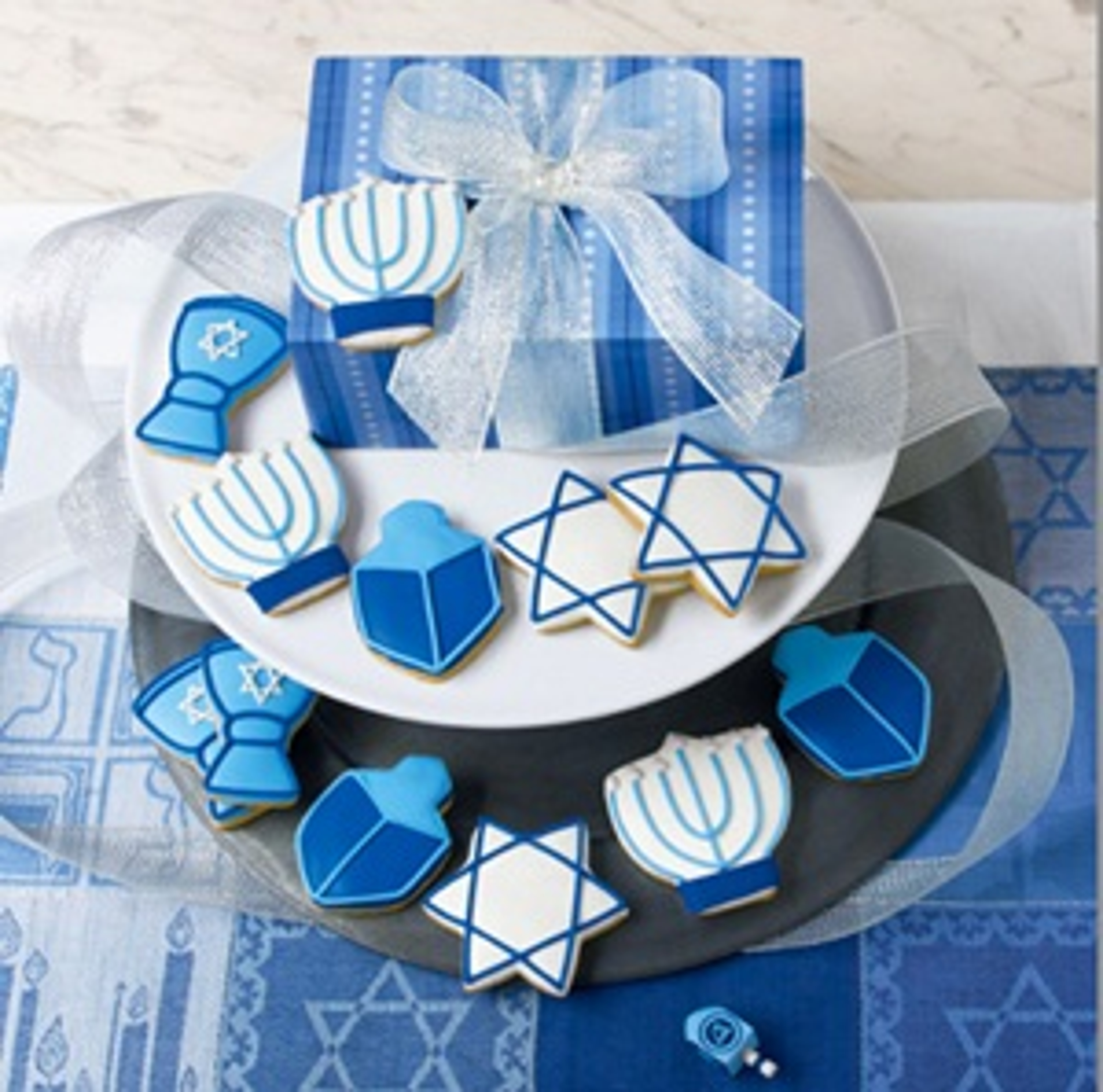 There's no better way to celebrate than with this tasty kosher cookie gift. Each Hanukkah cookie is hand decorated.