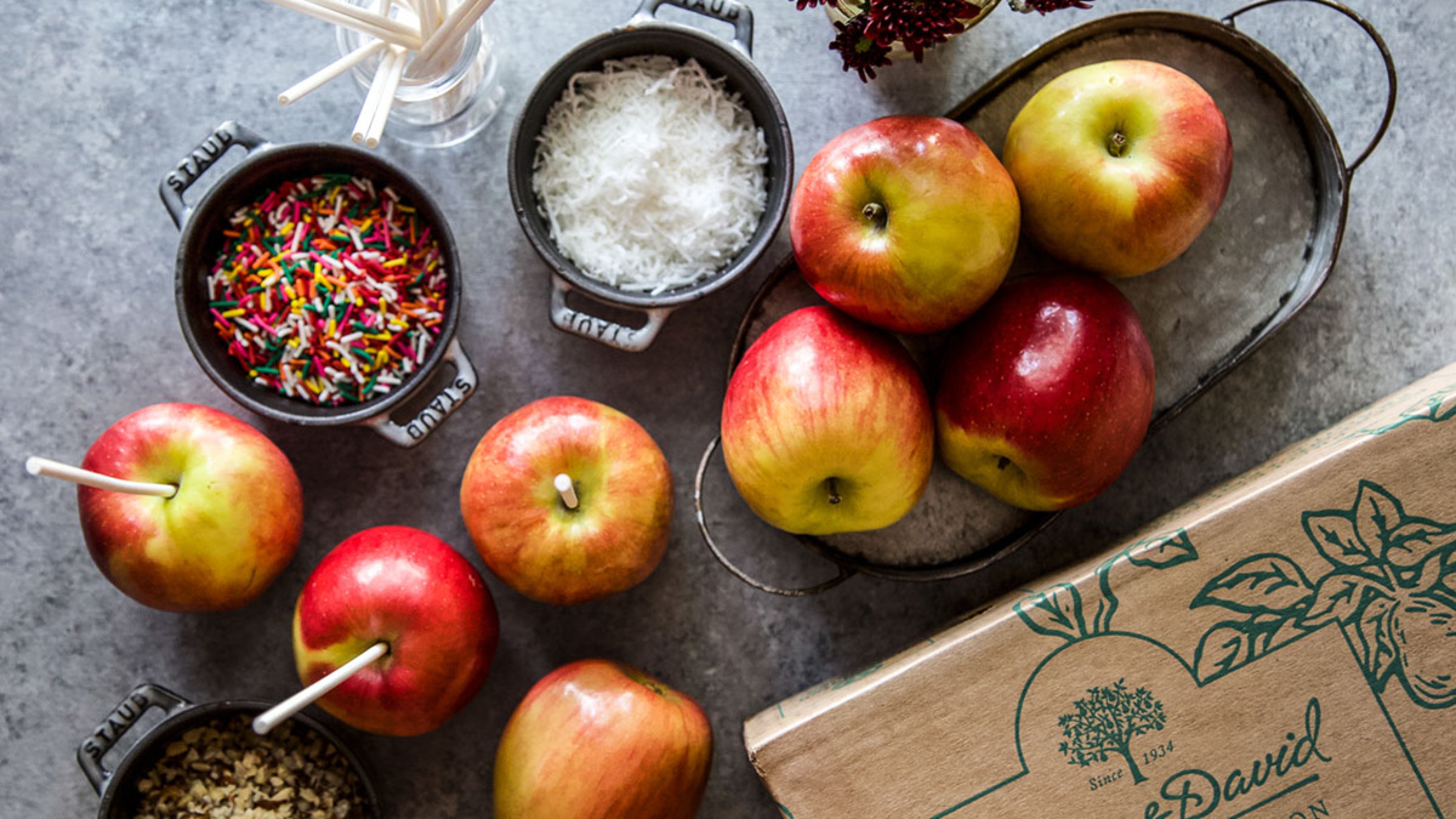 Process of making caramel apples.