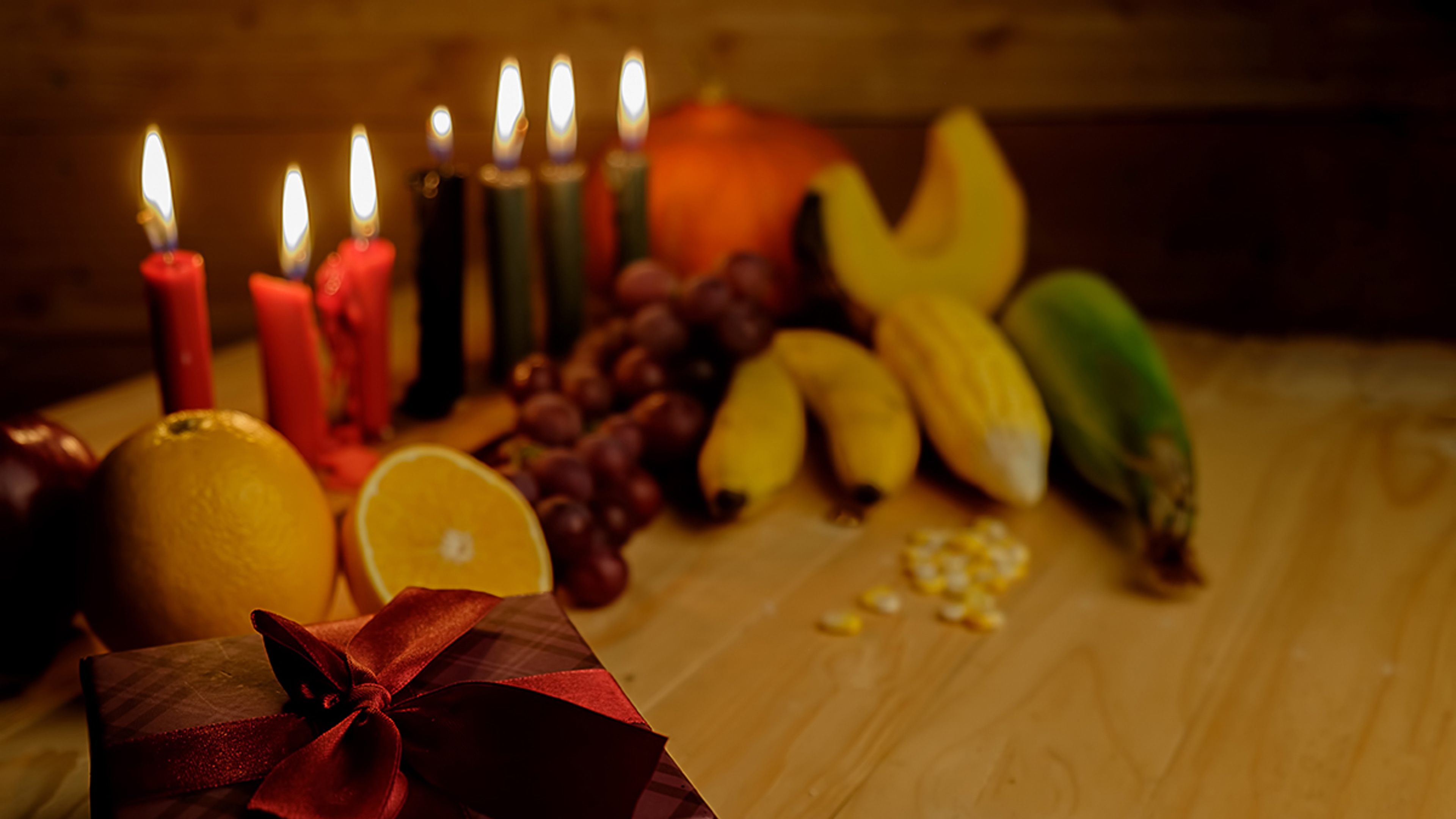 Article Cards Featured Image Kwanzaa fruit and candles