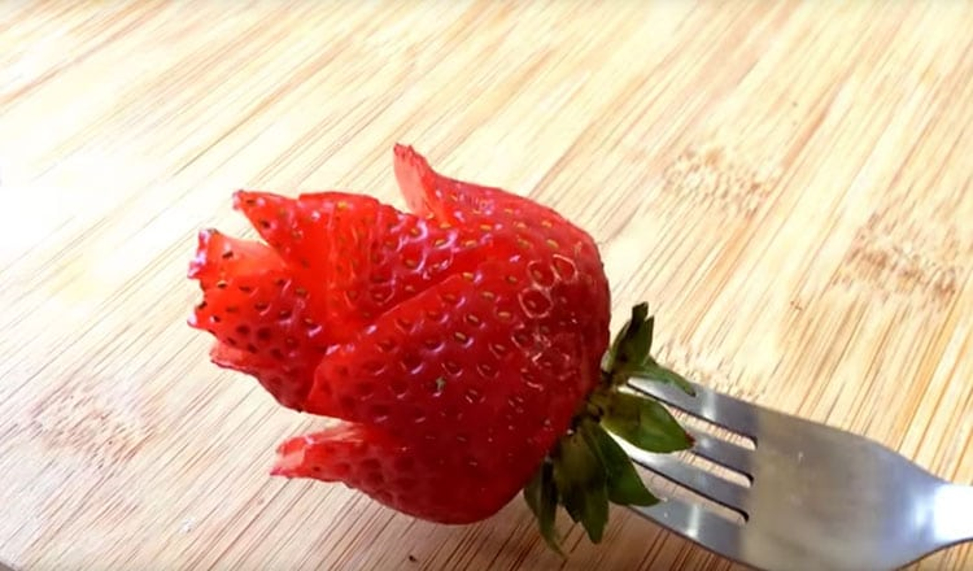 Finished strawberry rose on a fork