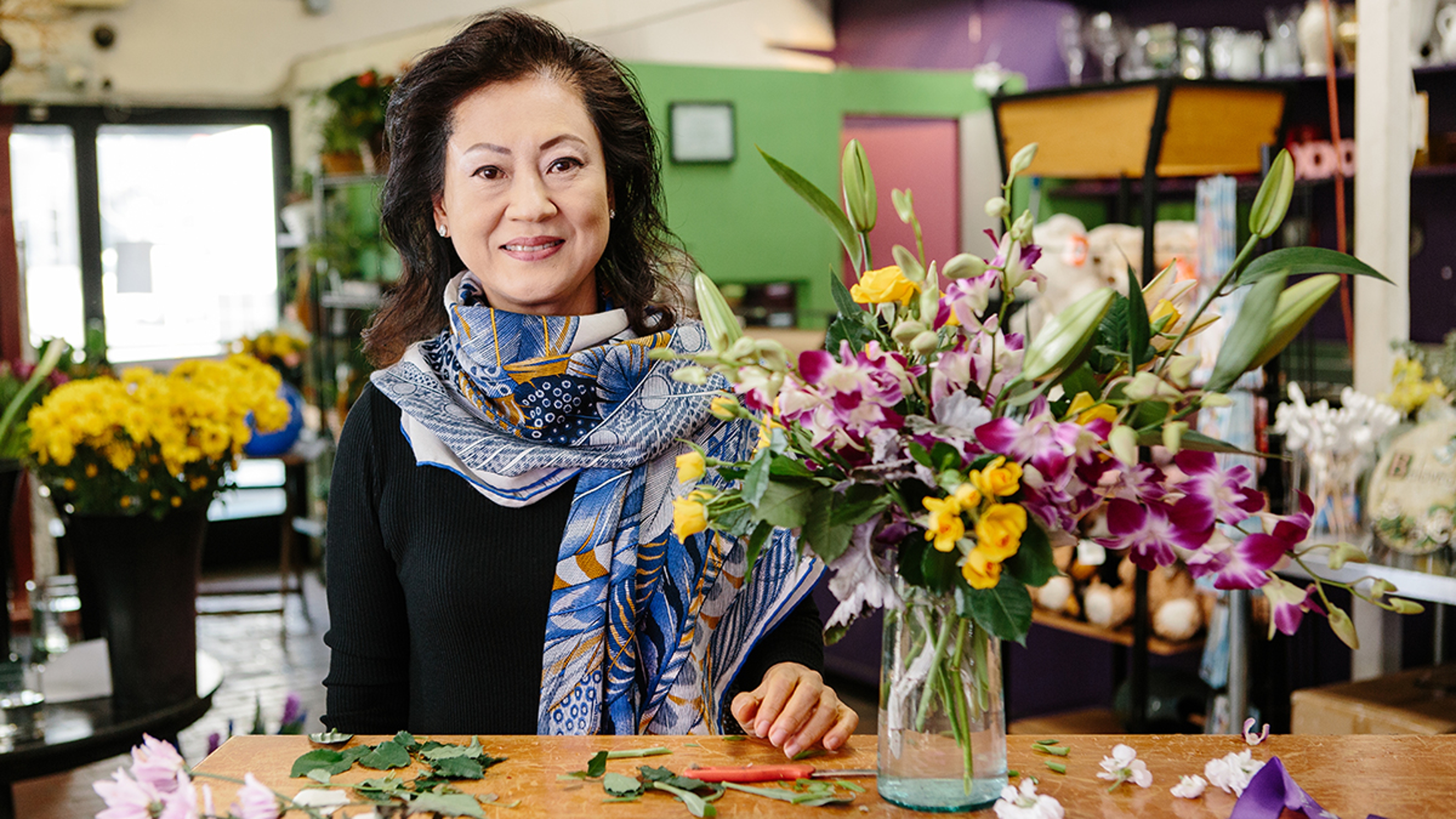 Photo of local florist Vivian Chang and an arrangement at her Los Angeles flower shop.