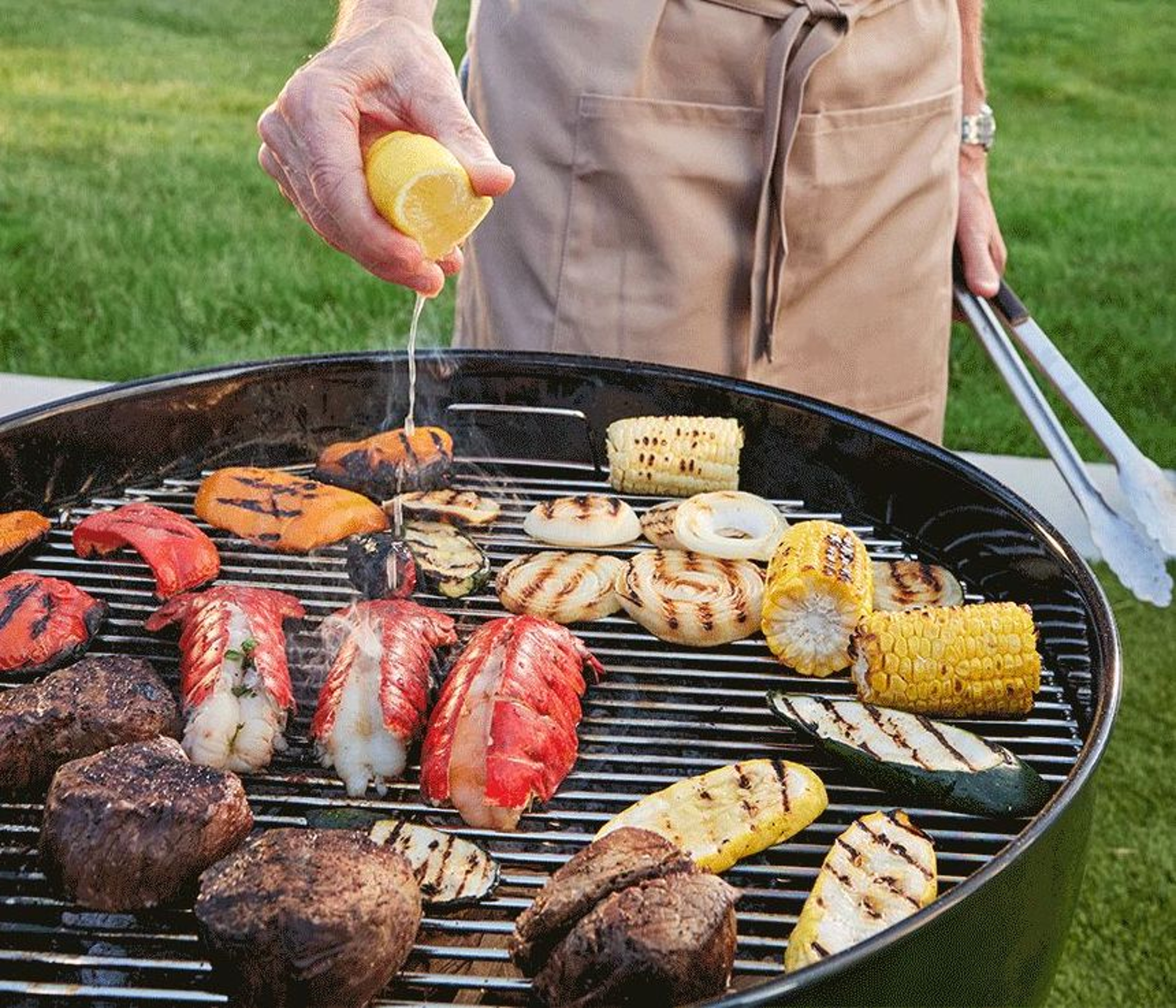 A man showing how to grill various proteins on a charcoal grill.