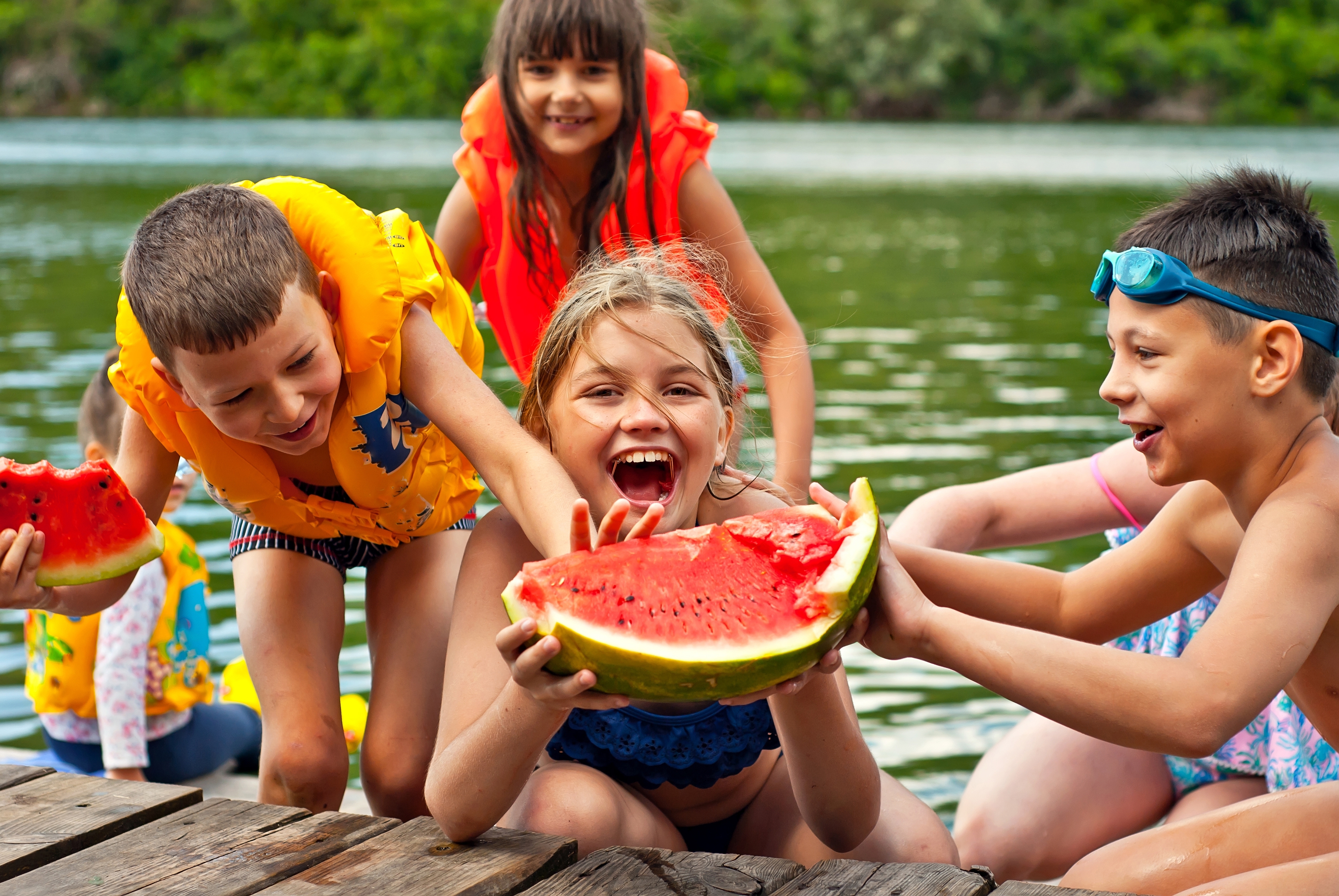 Article Cards Featured Image summer camp snacks kids eating watermelon