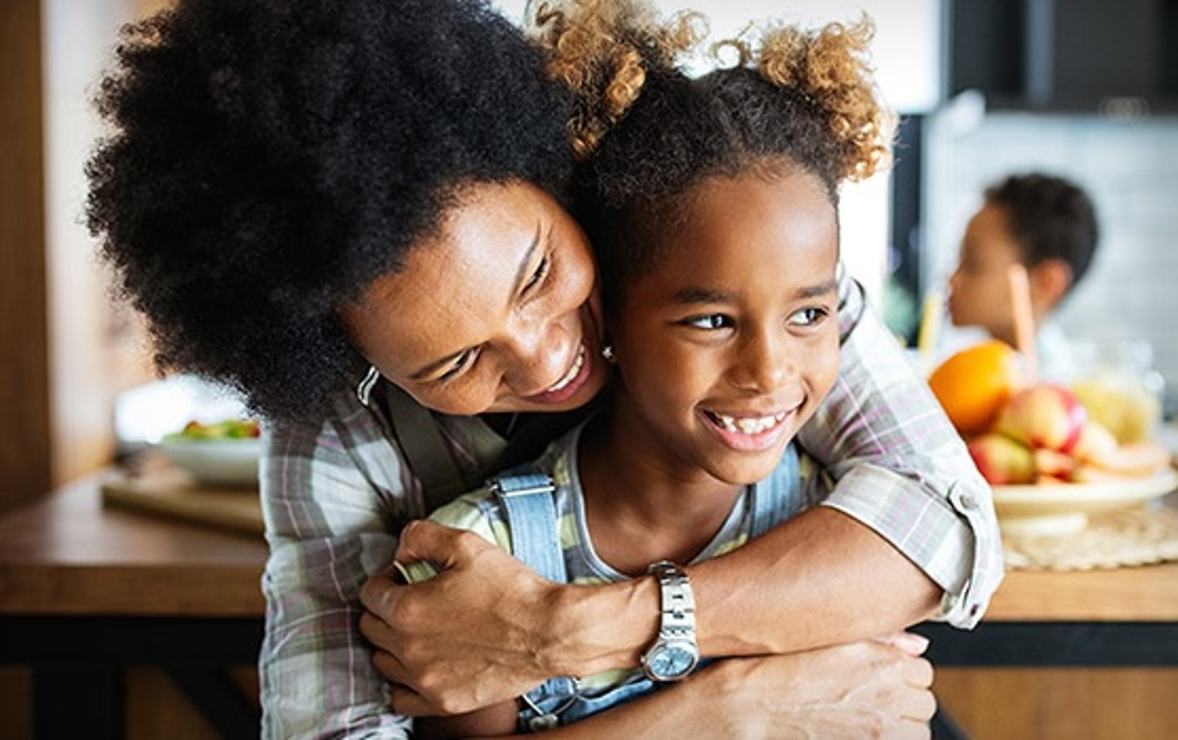 amazing mom hugging girl photo