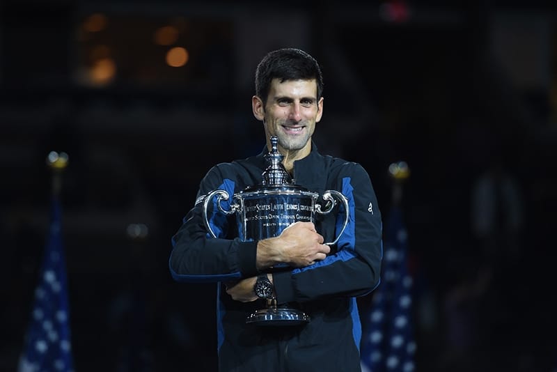 Novak Djokovic holding a trophy