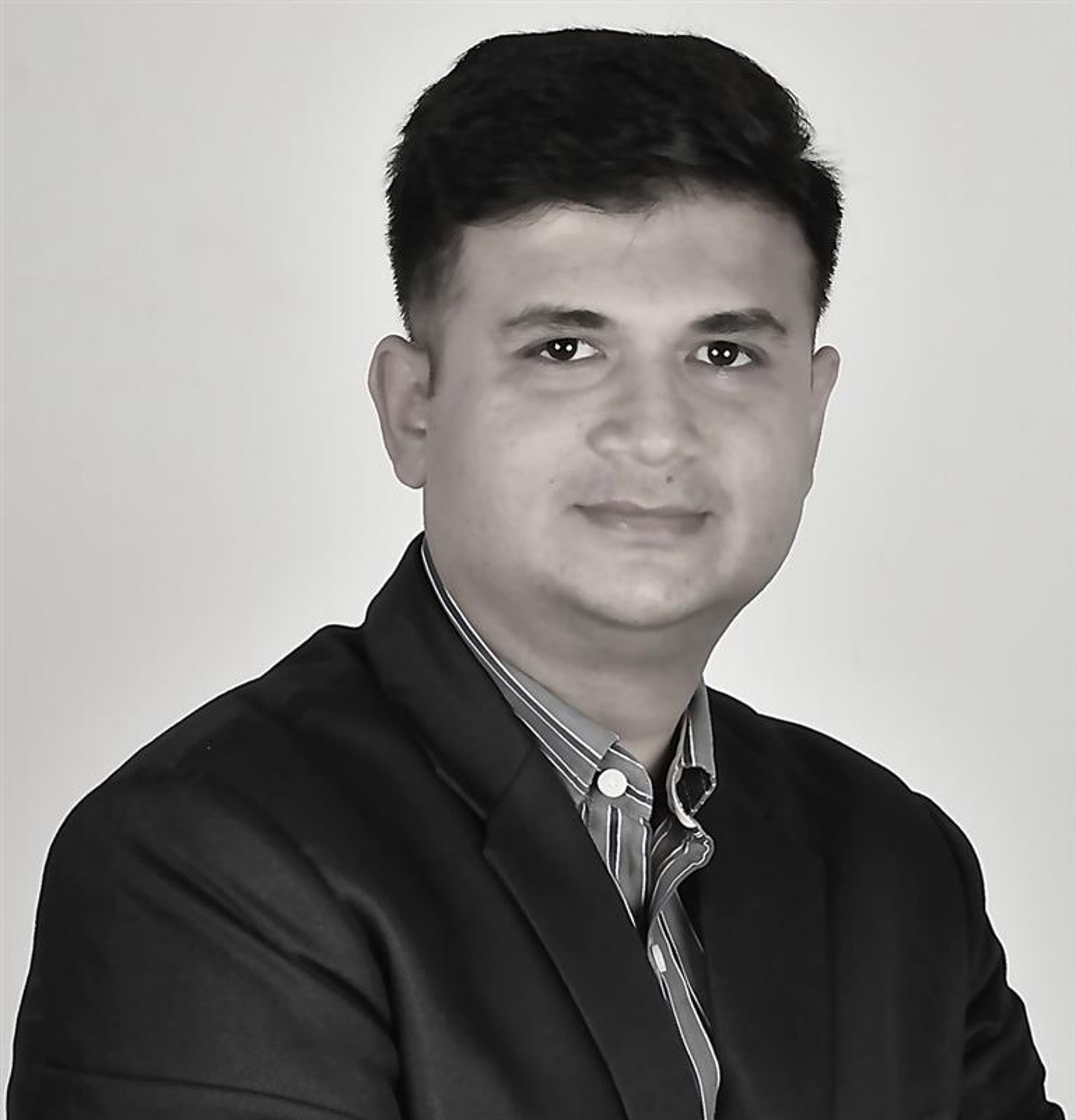 headshot of Vatsal Acharya
