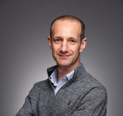 headshot of Simon Rice