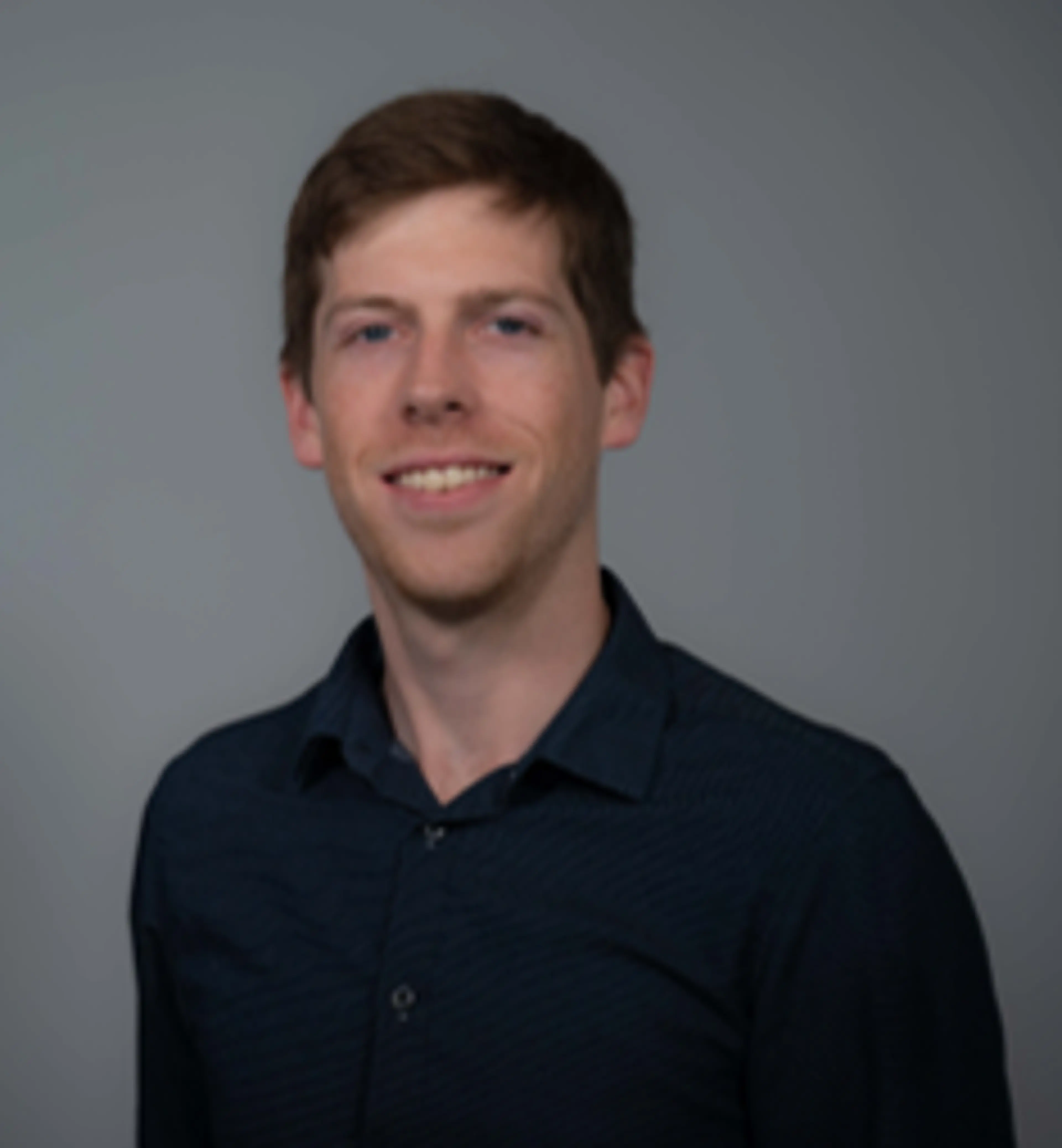 headshot of Dylan Corcoran