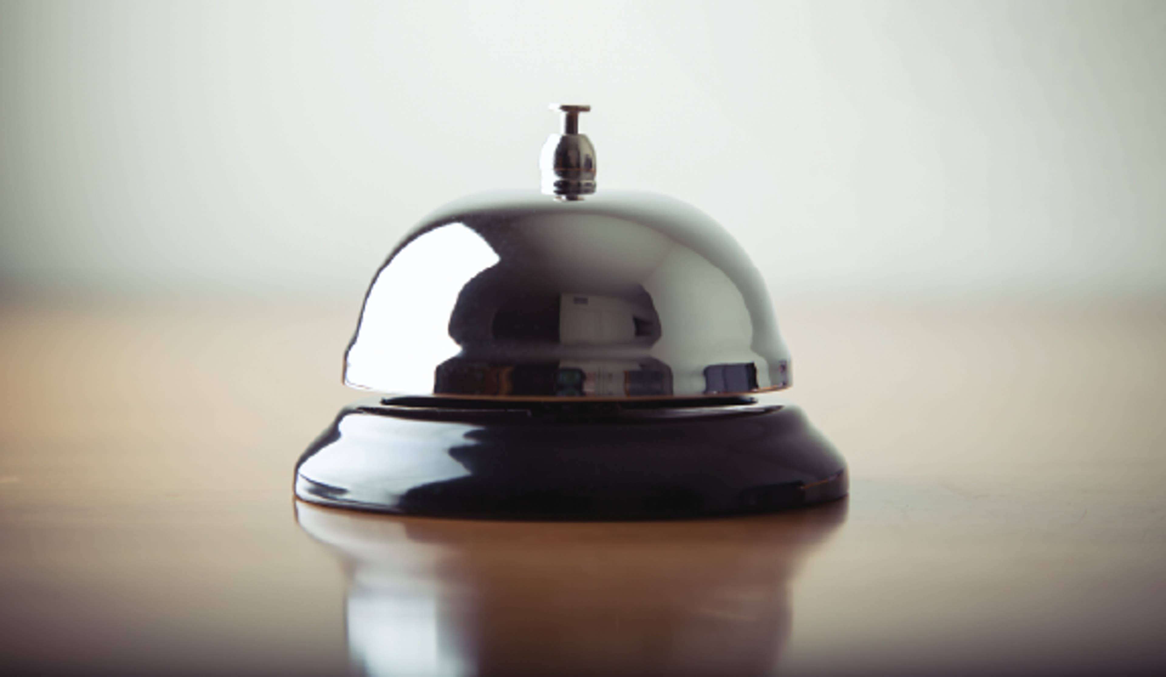 a silver desk bell