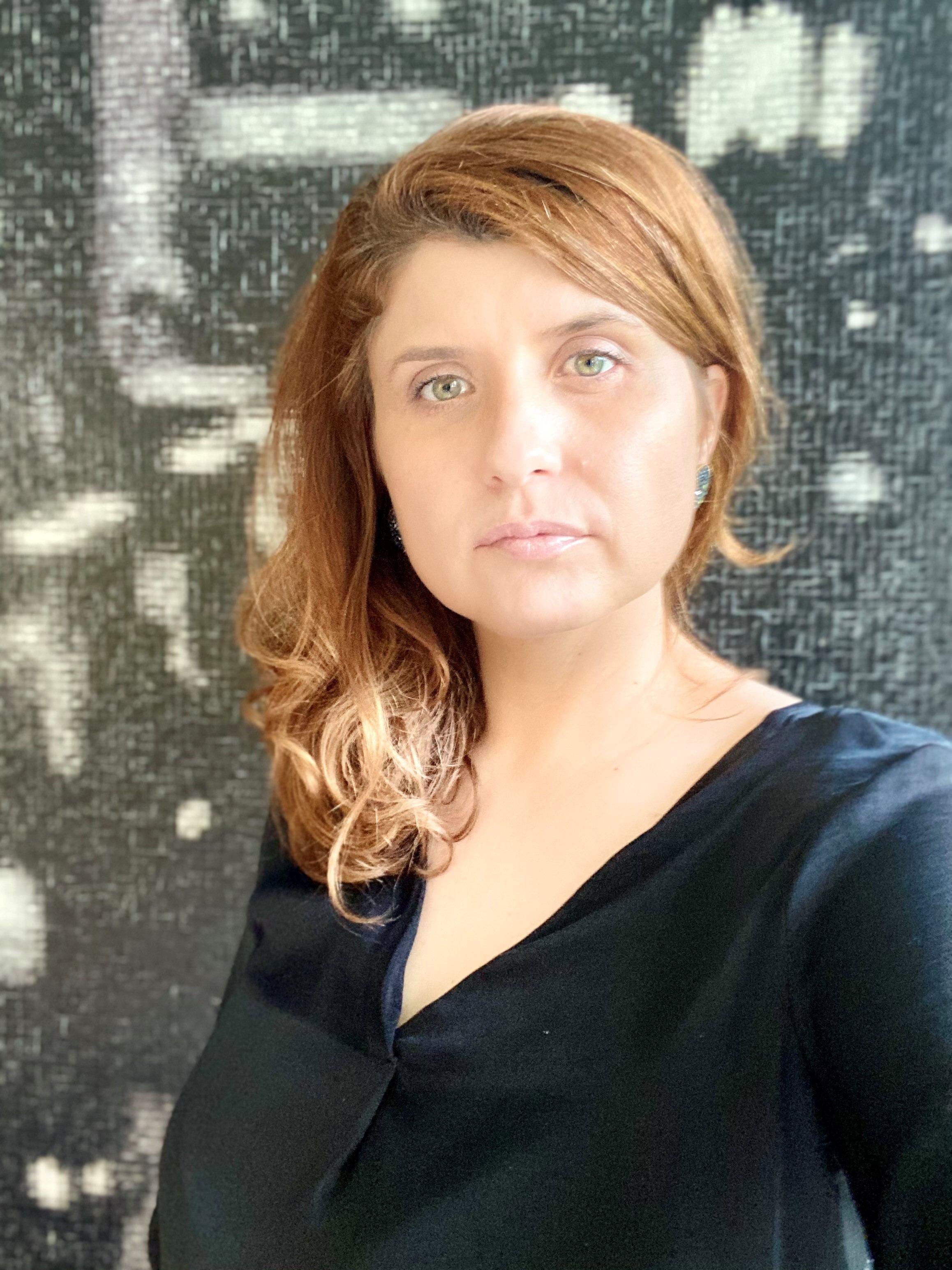 headshot of Adriana Mihaela Neagu