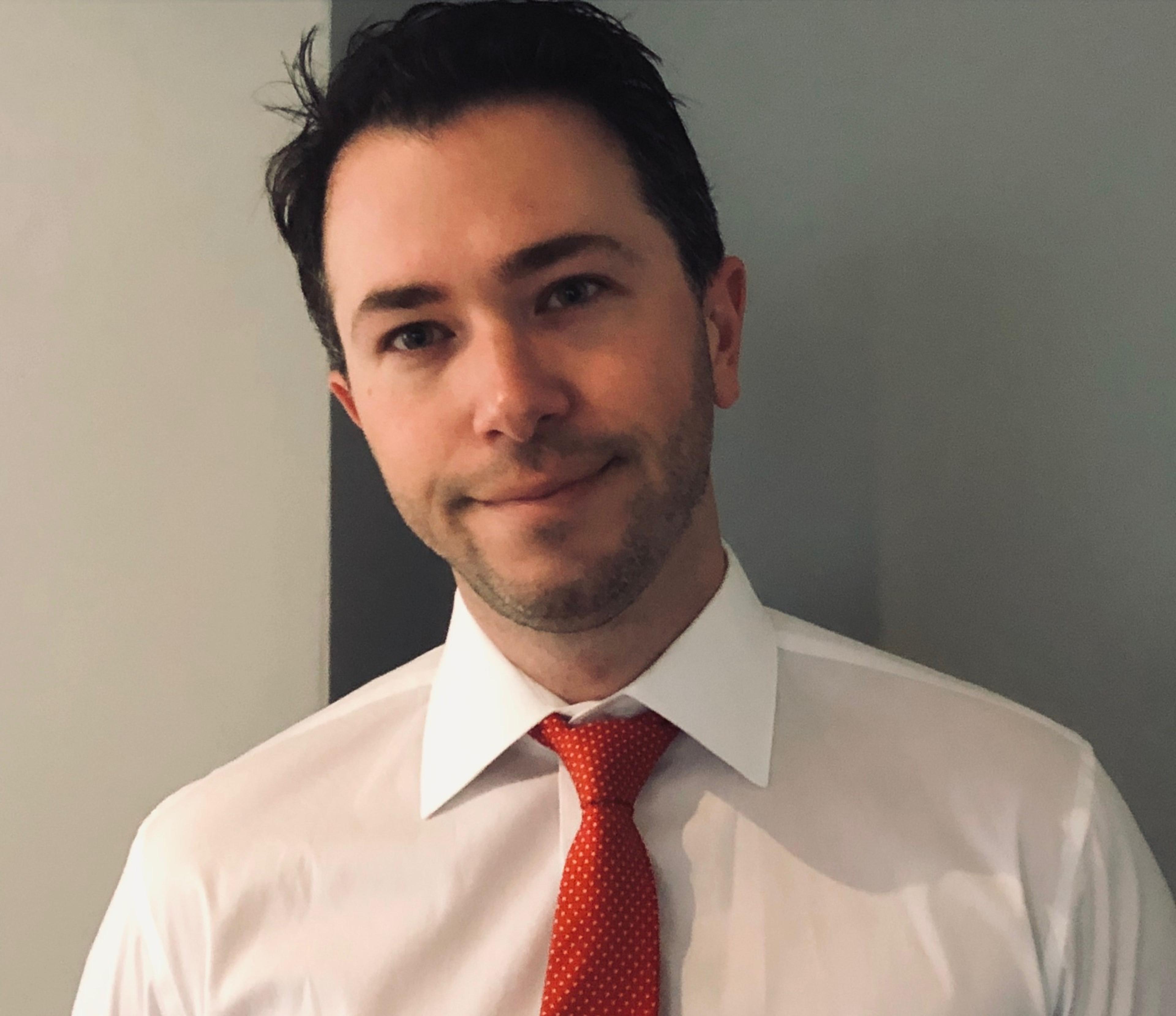 headshot of Sam Singer