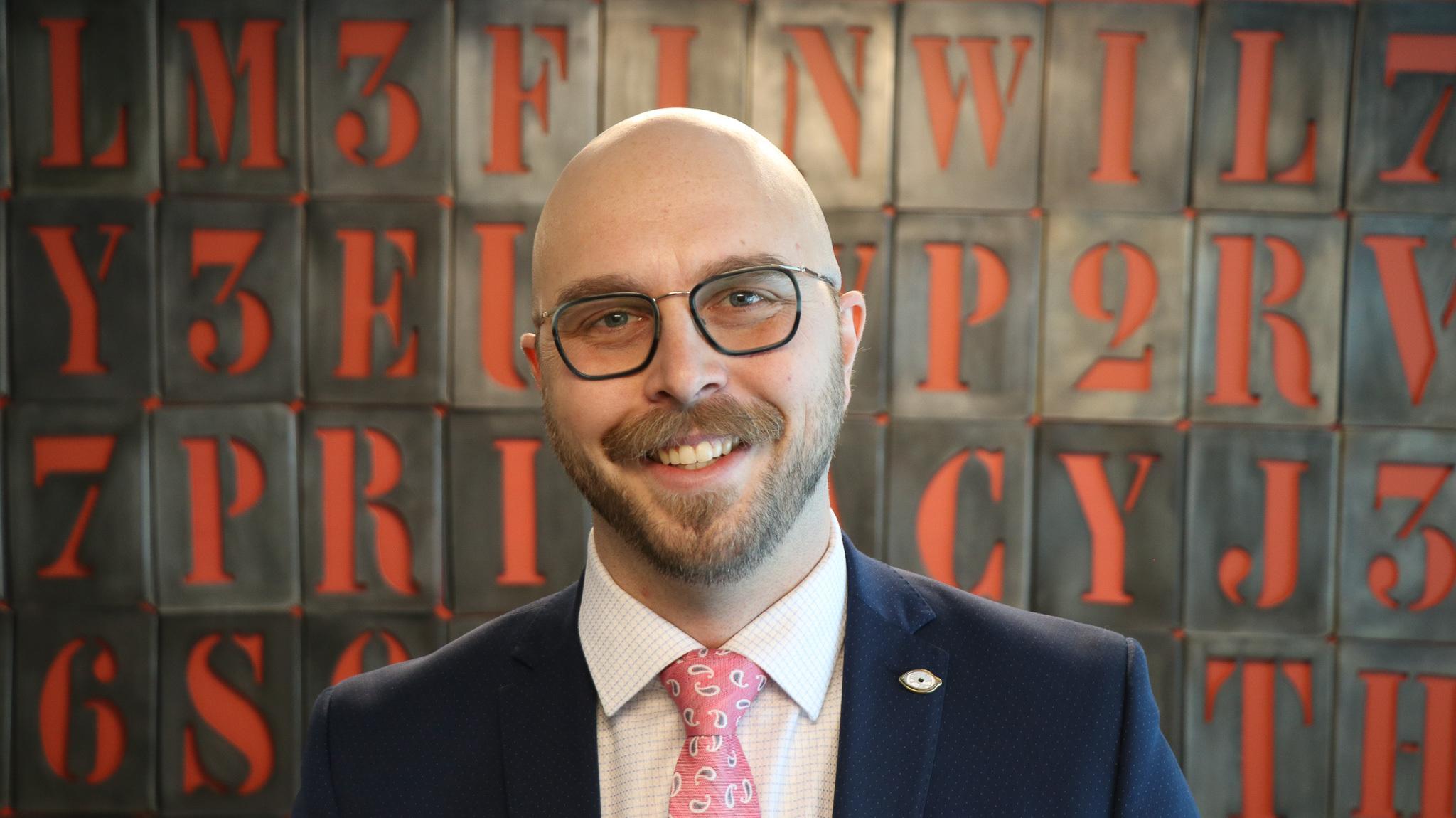 headshot of Cobun Zweifel-Keegan