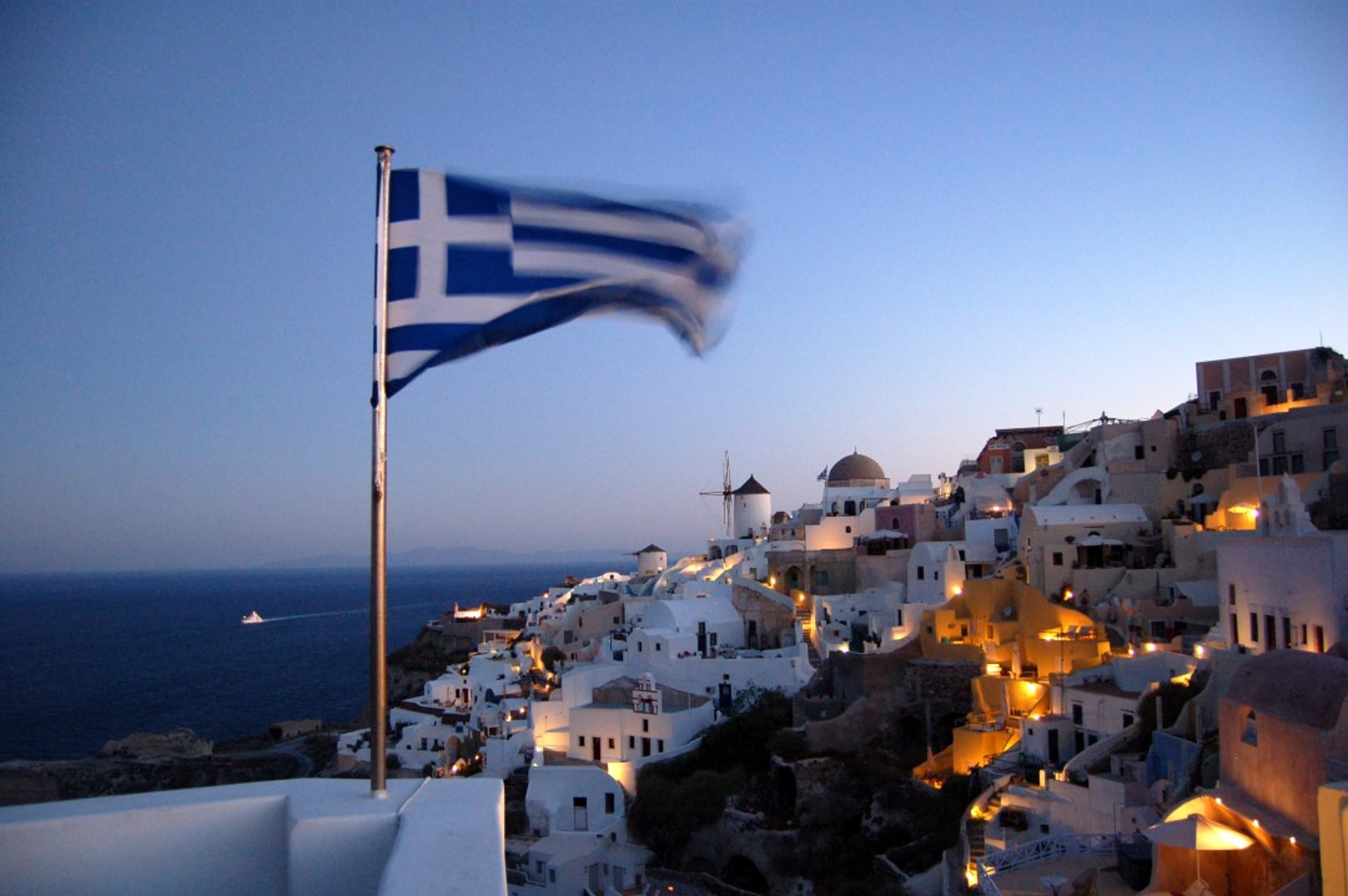 greece-flag-city-behind-europe.jpg