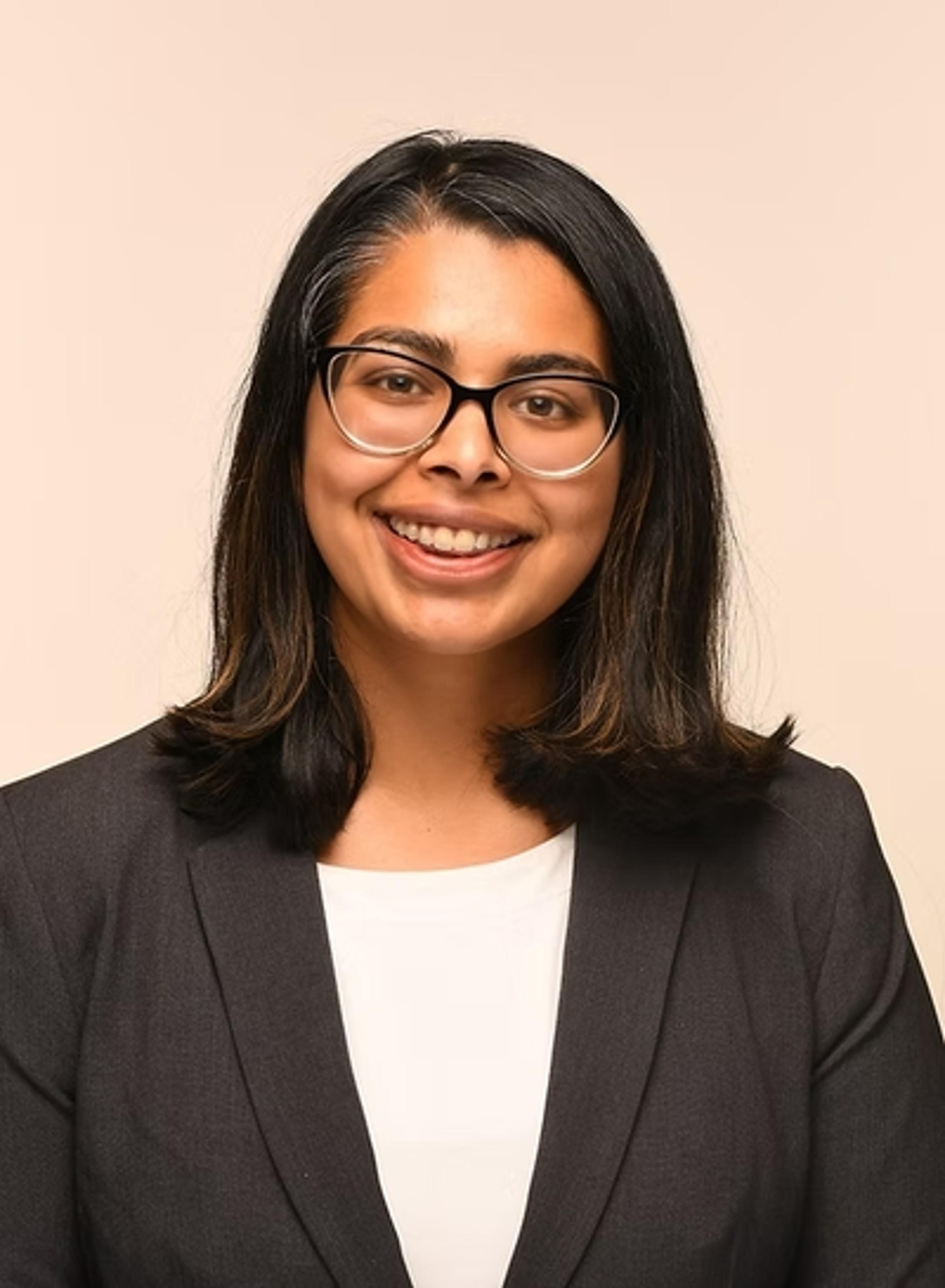 headshot of Veena Calambur