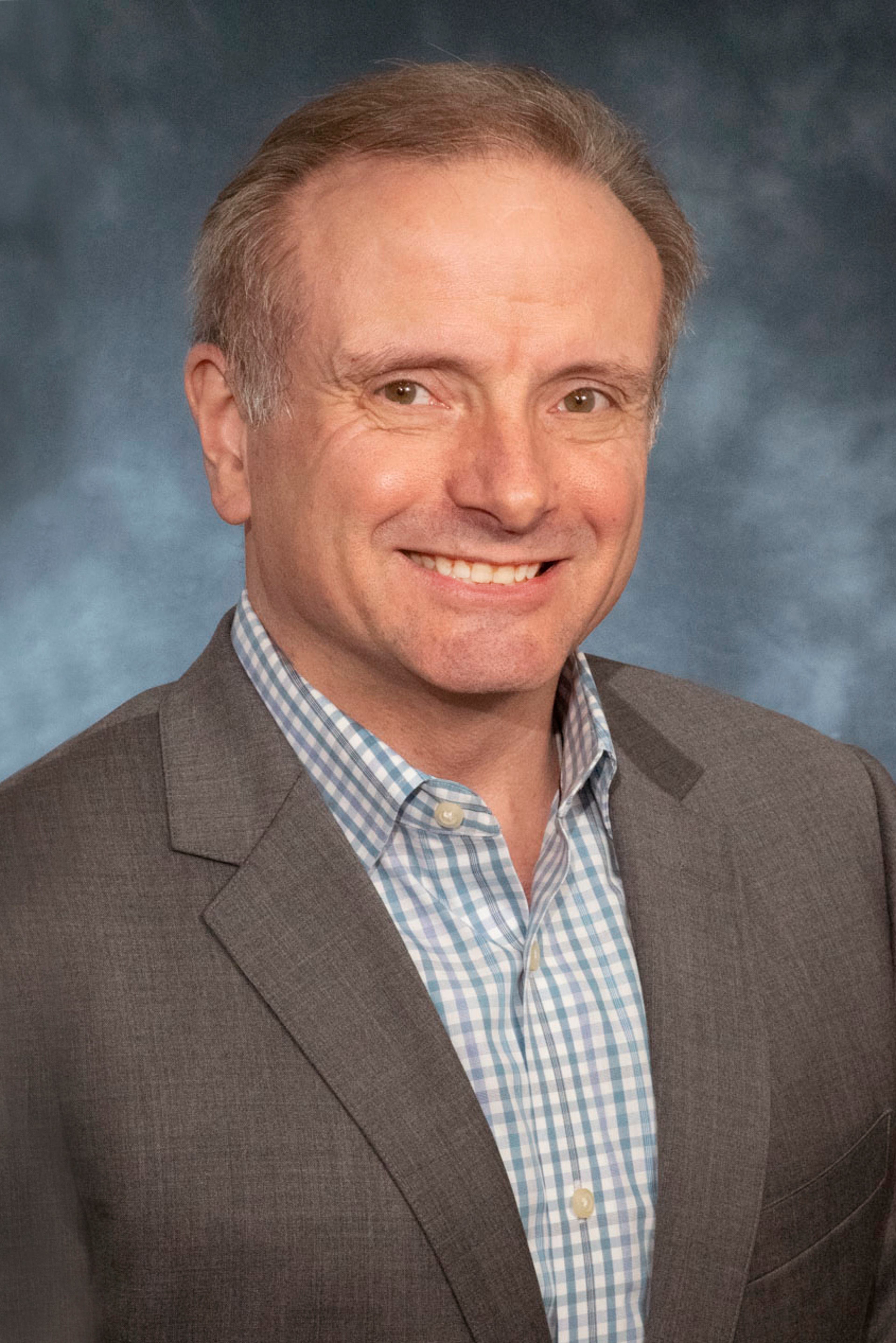 headshot of Douglas Miller