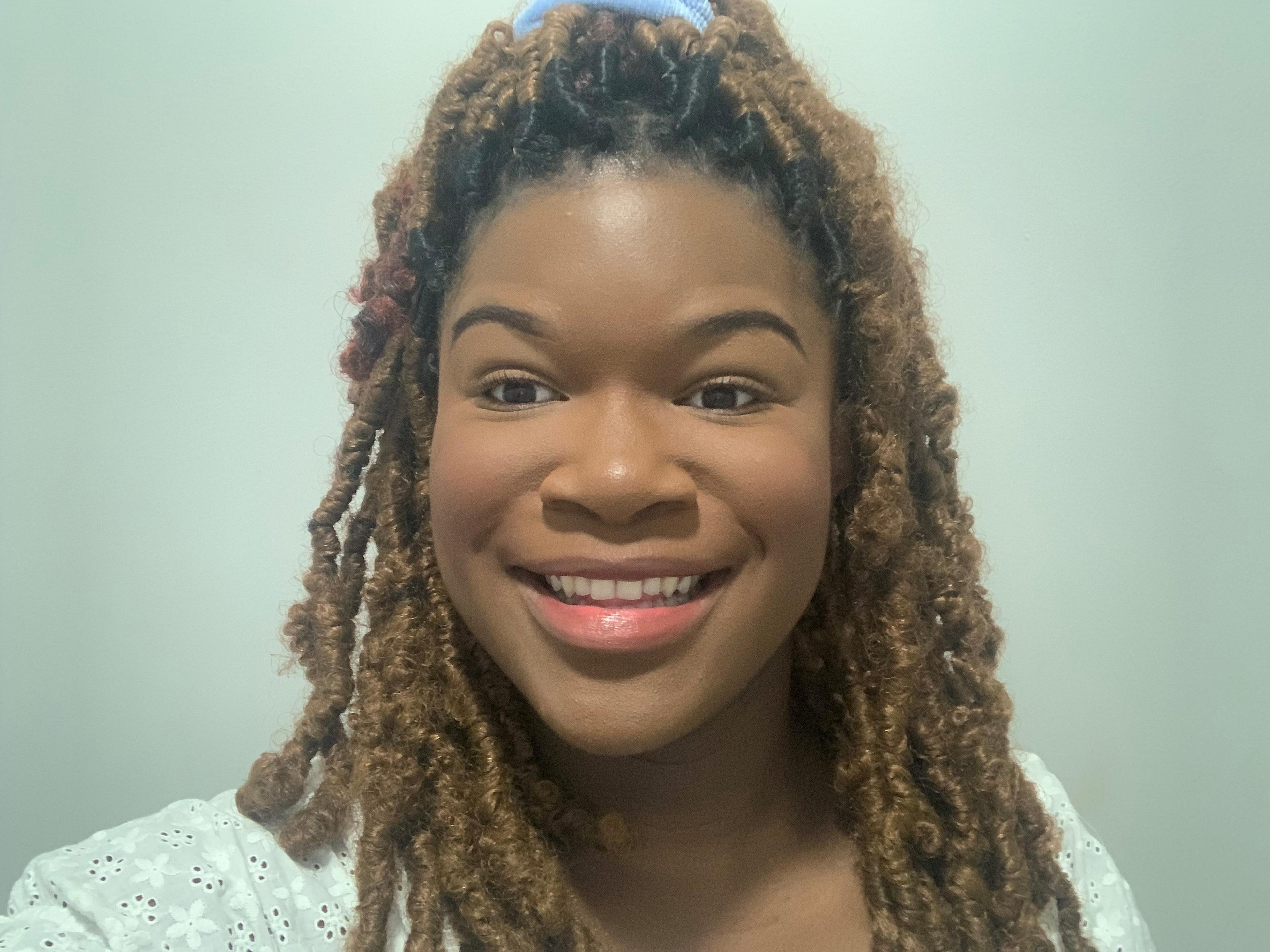 headshot of Demilade Adeniran