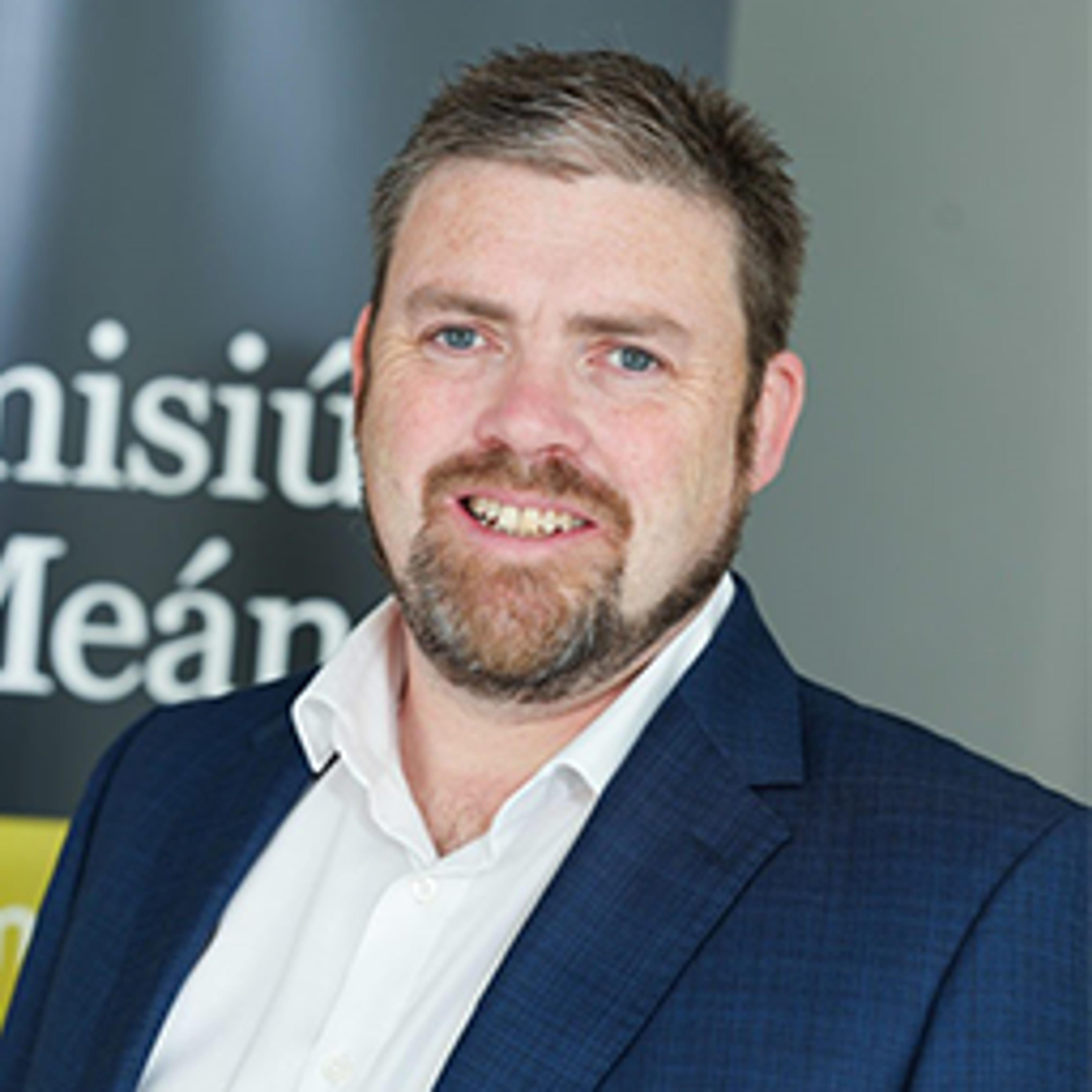 headshot of John Evans