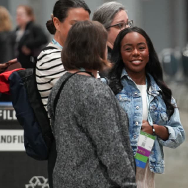 Two women at an IAPP conference
