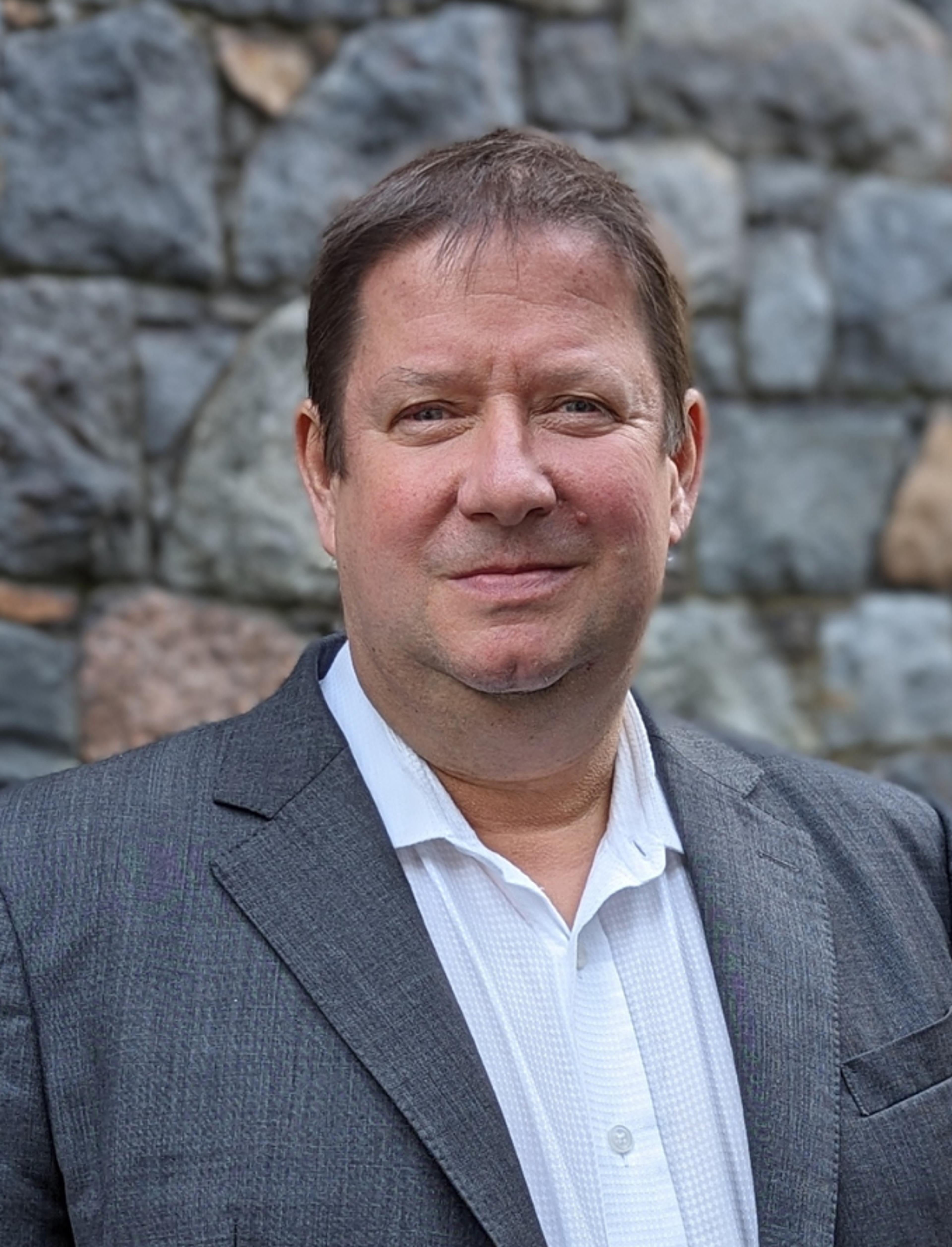 headshot of Brent Homan