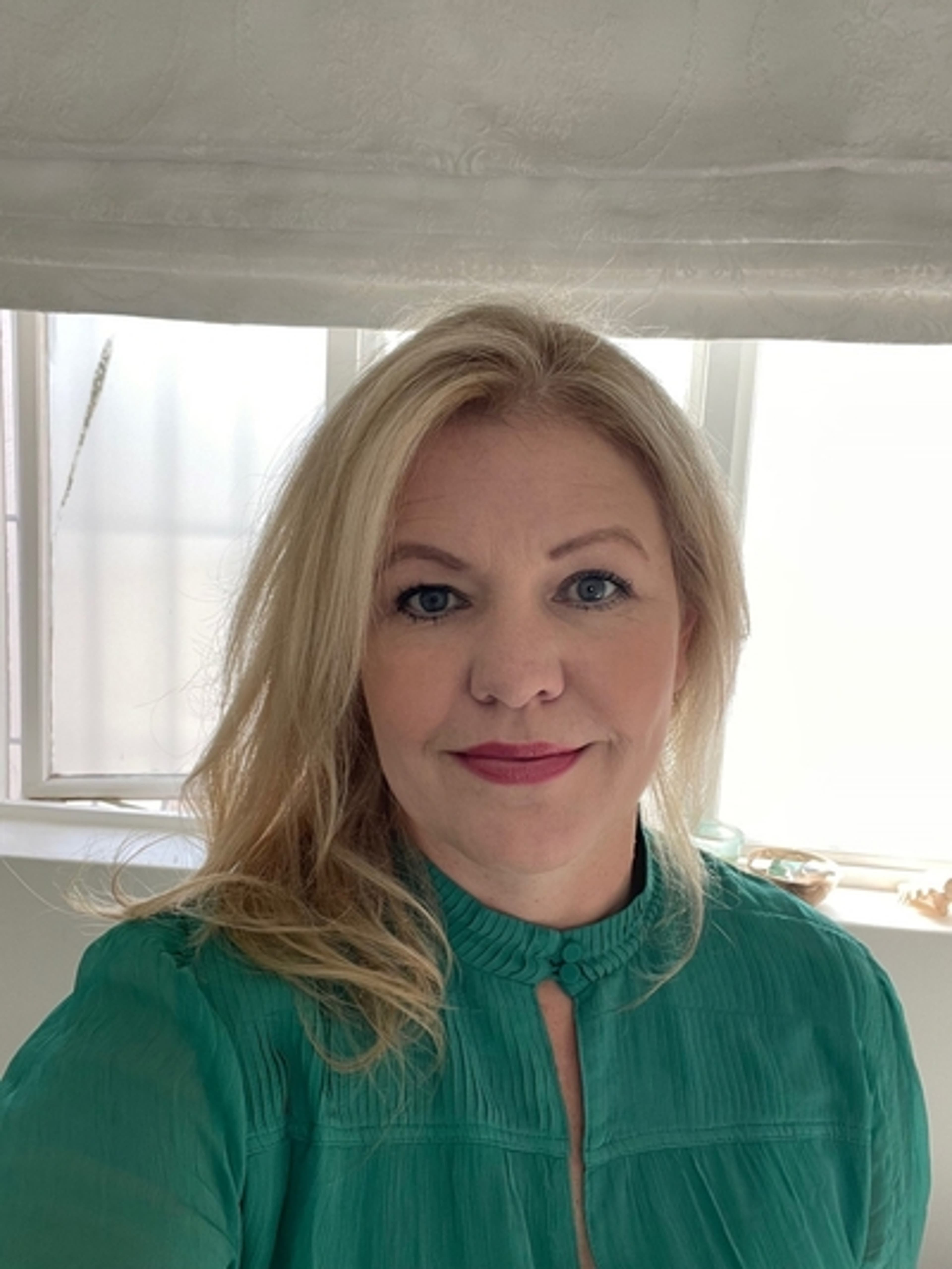 headshot of Janine West