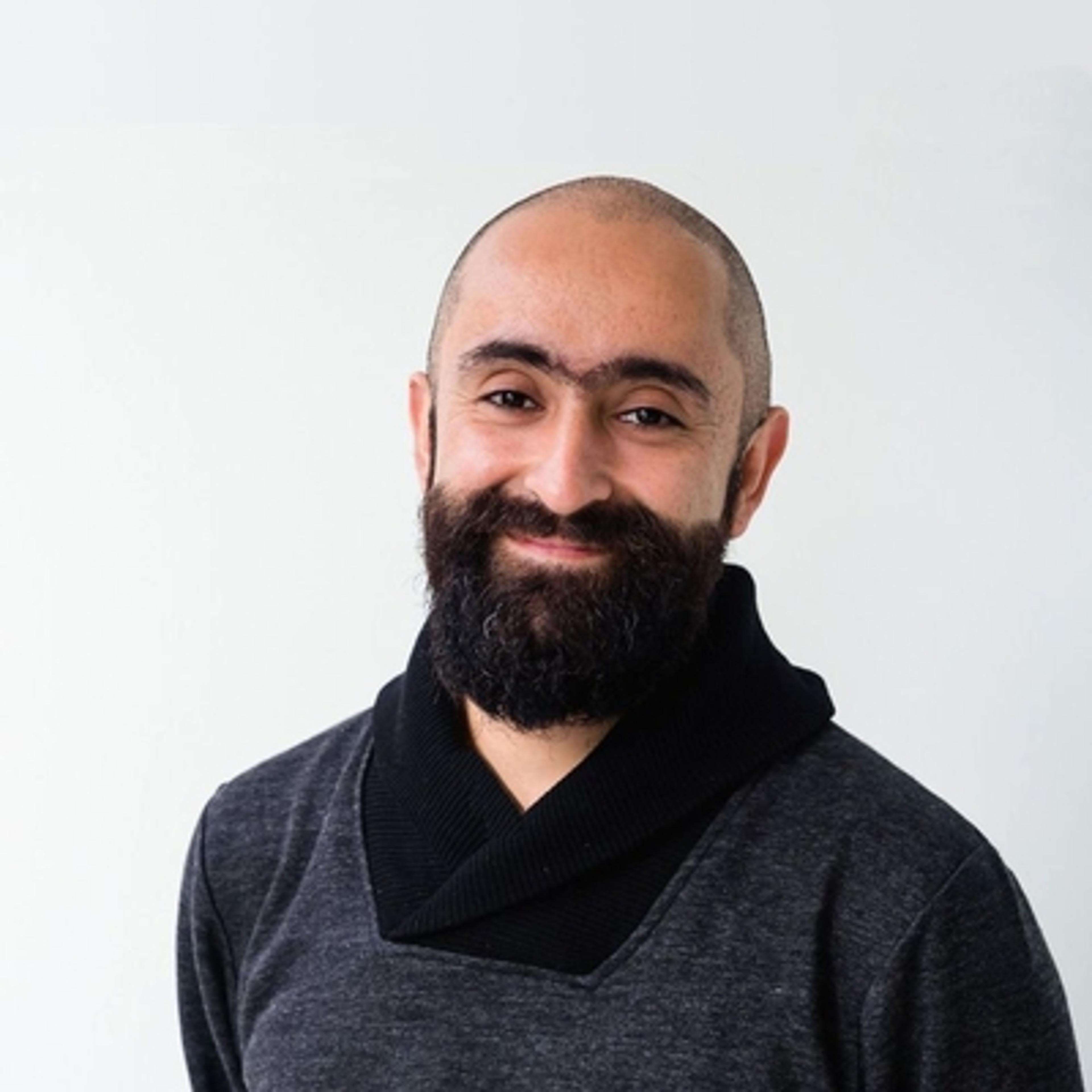 headshot of Pedro Reynolds-Cuéllar