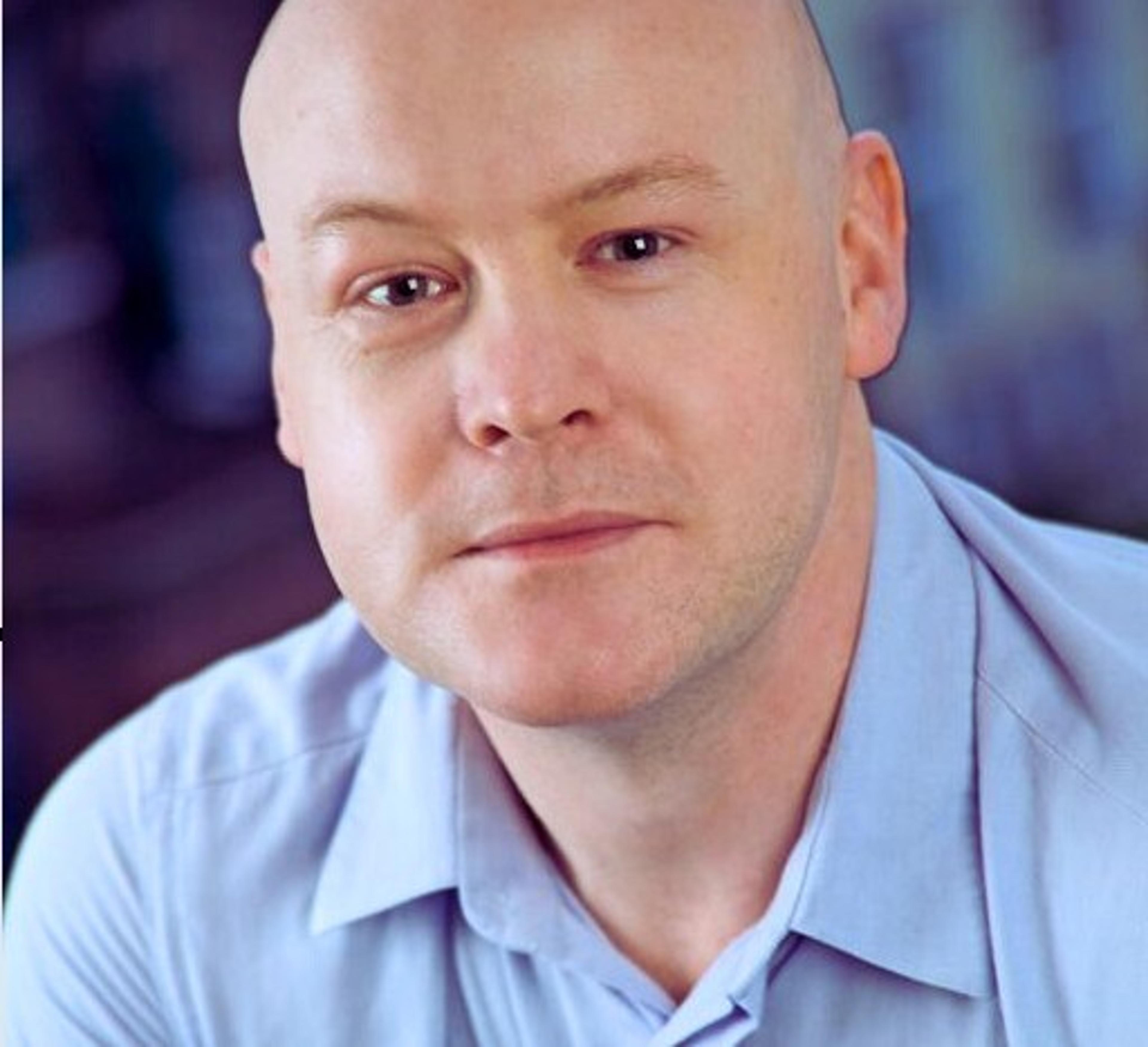 headshot of John Cush