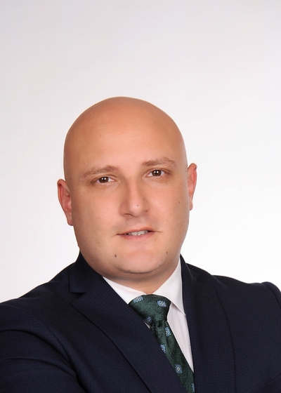 headshot of Burak Özdağıstanli