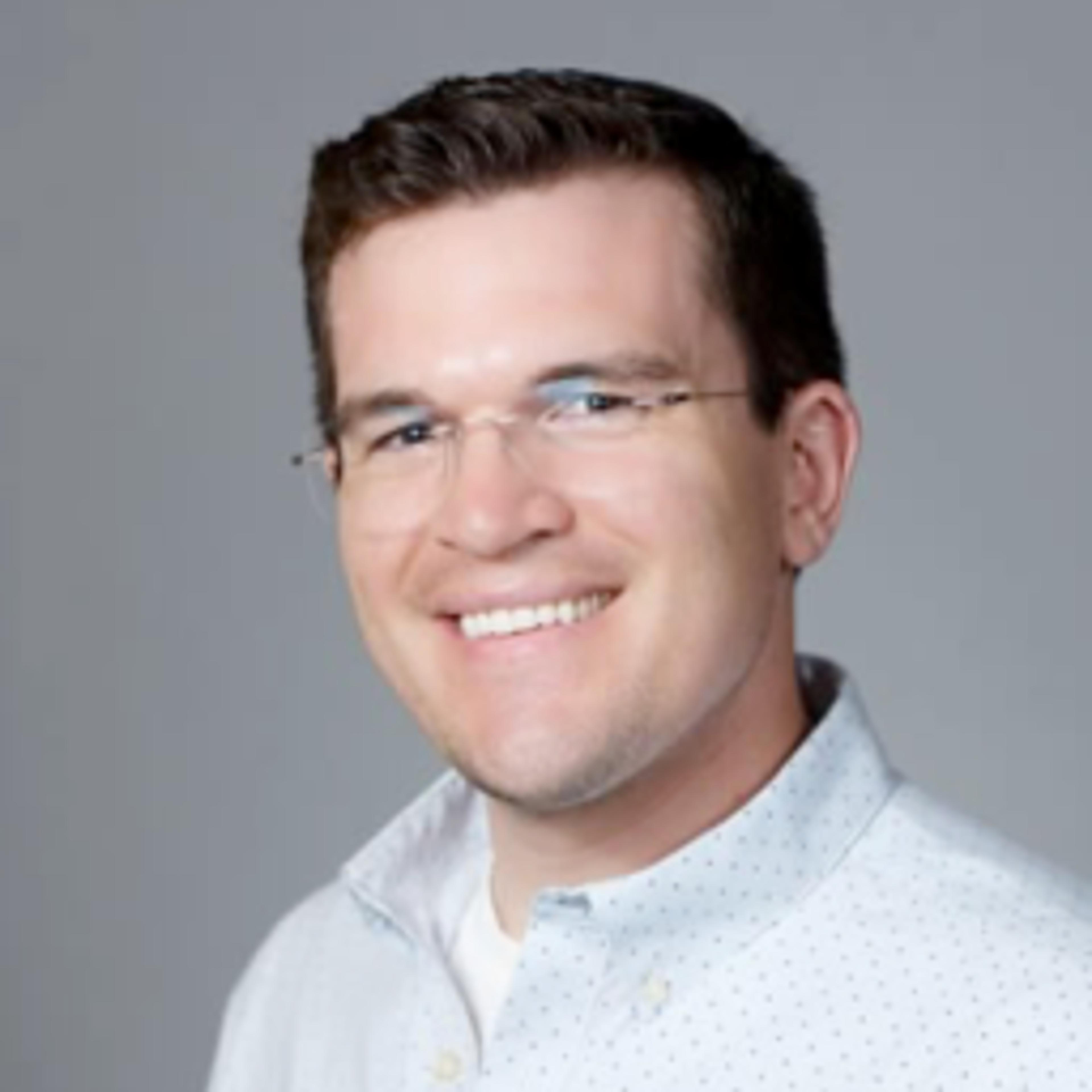 headshot of Samuel Adams