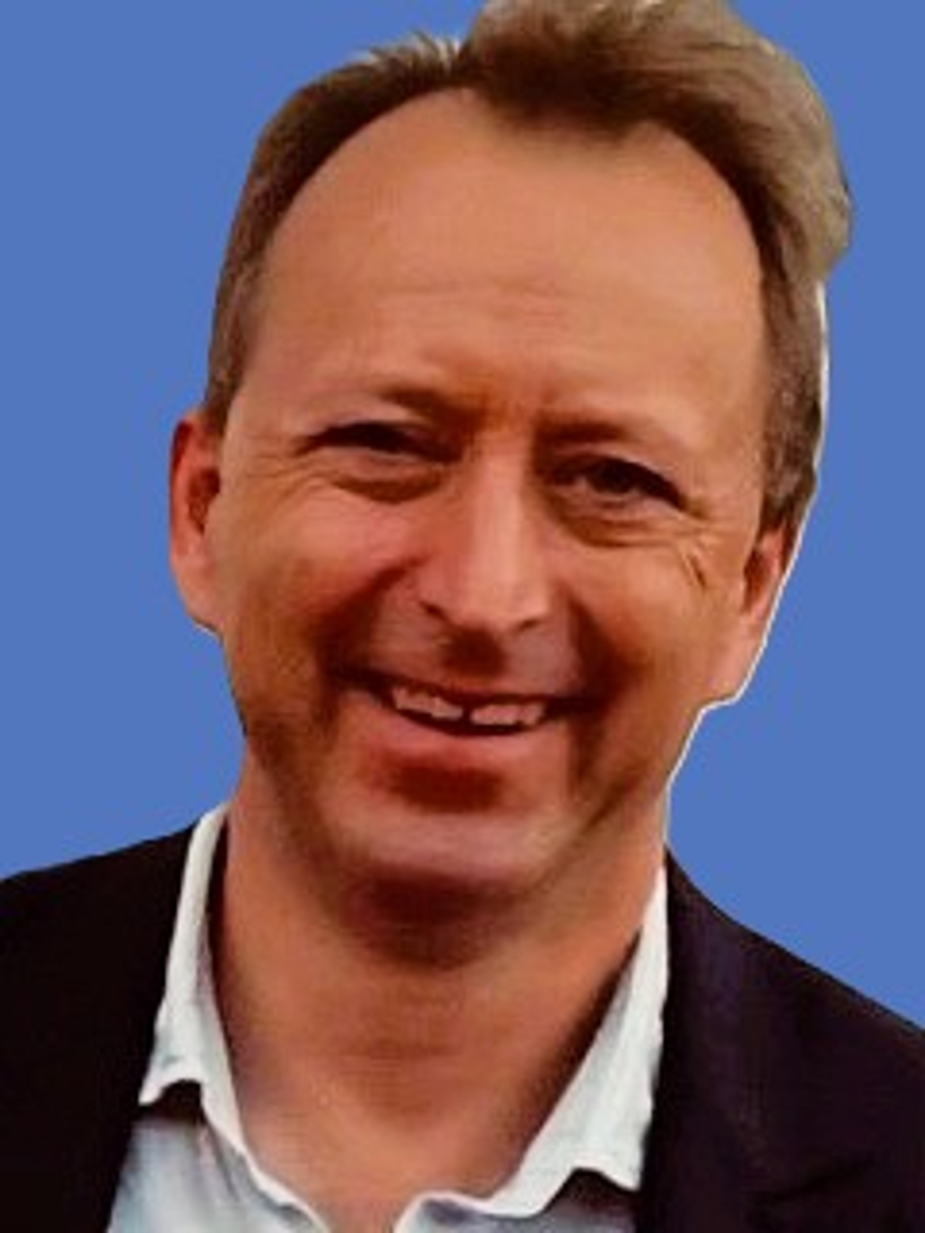 headshot of Peter Farrell