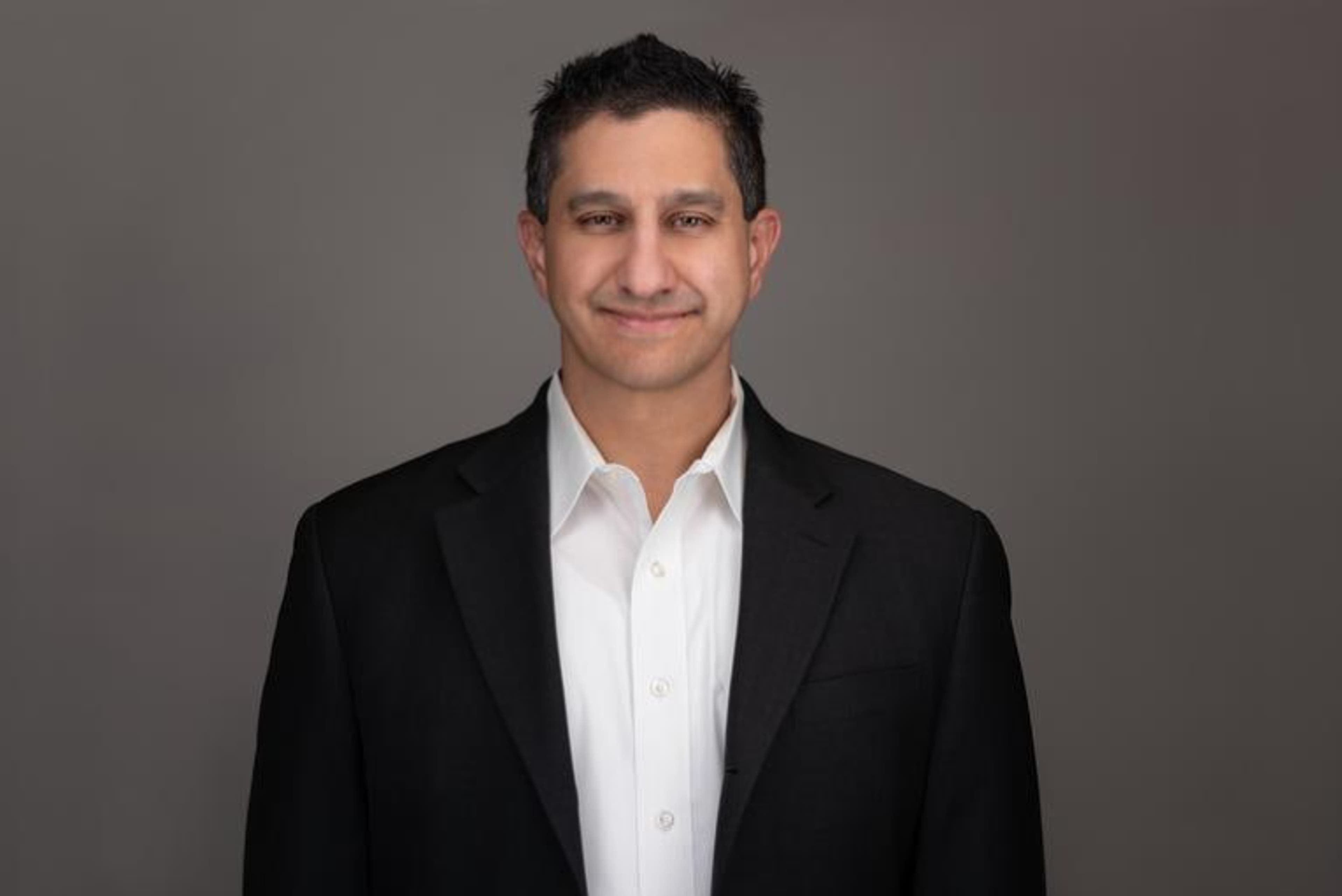 headshot of Dennis Dayman