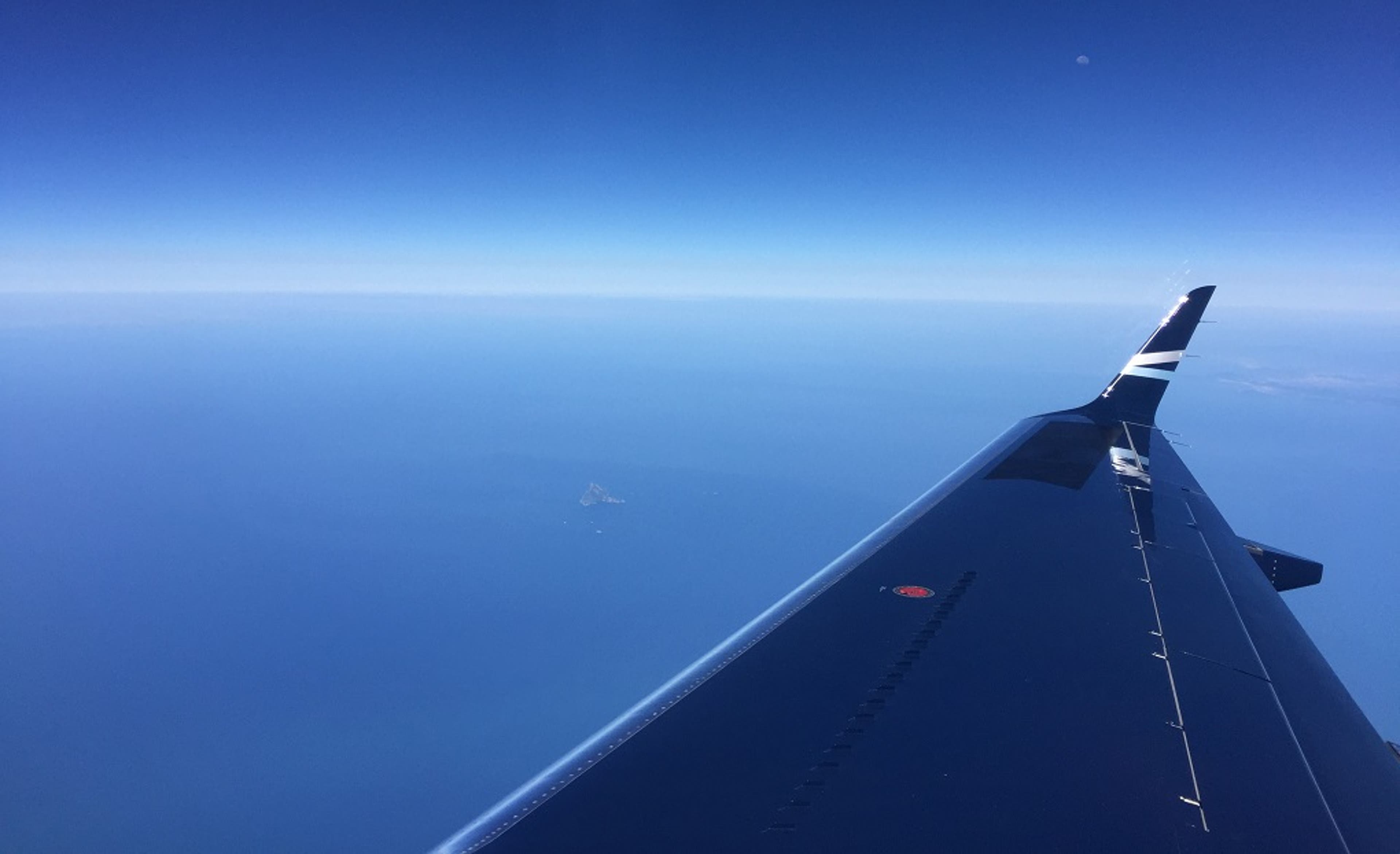 plane-wing-over-ocean-other.jpg