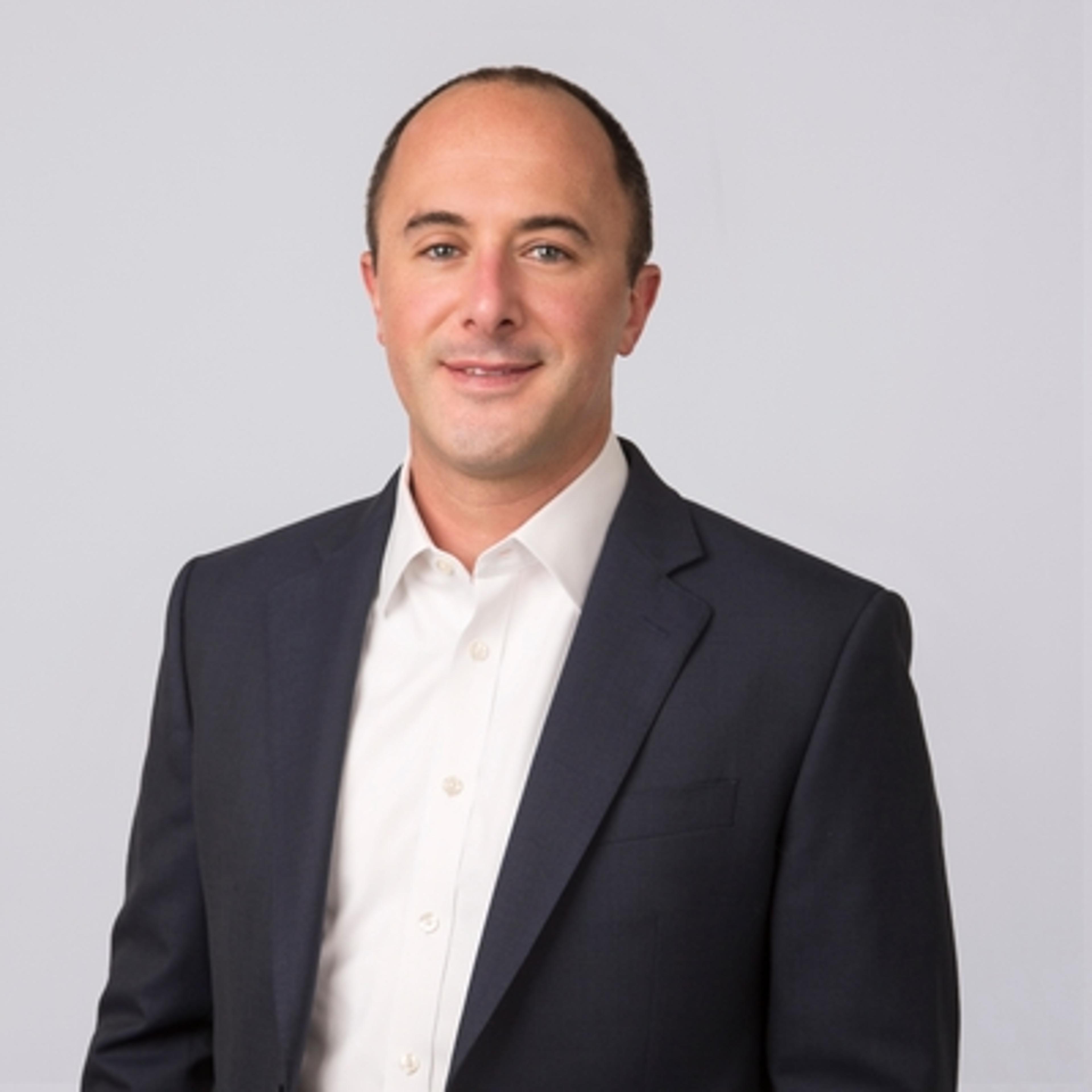 headshot of Sam Kaplan