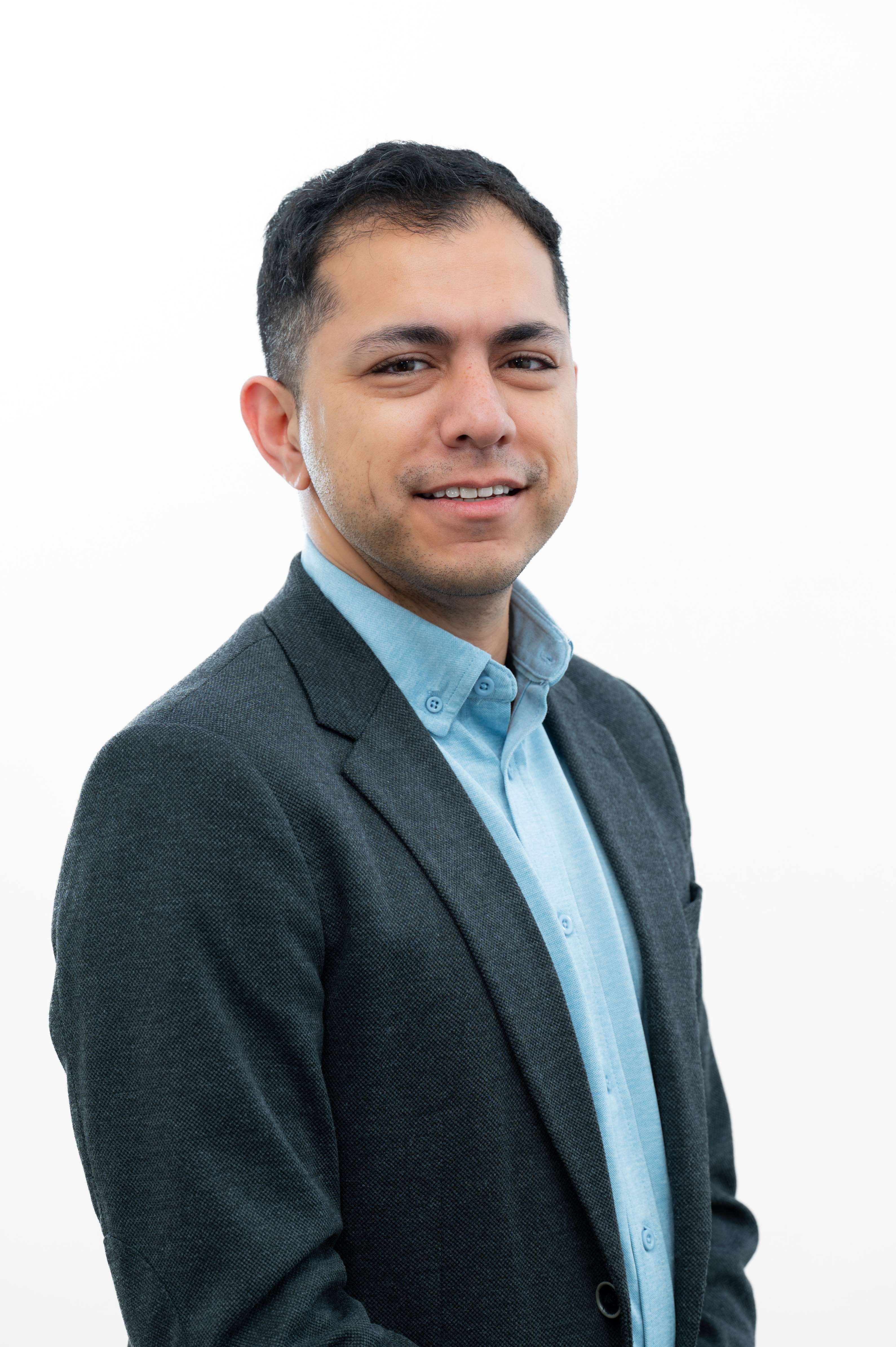 headshot of Ugur Ozer