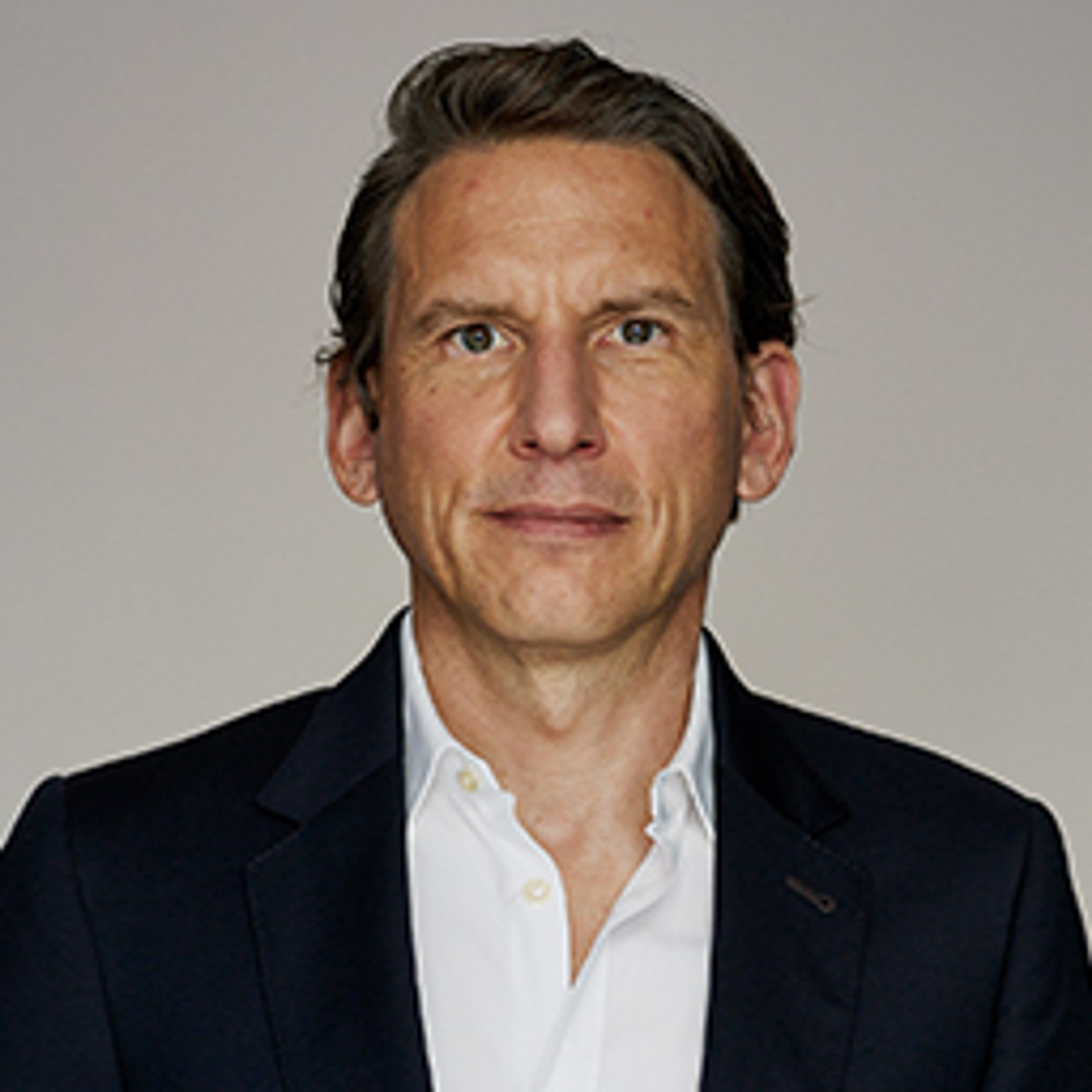 headshot of Ulrich Baumgartner