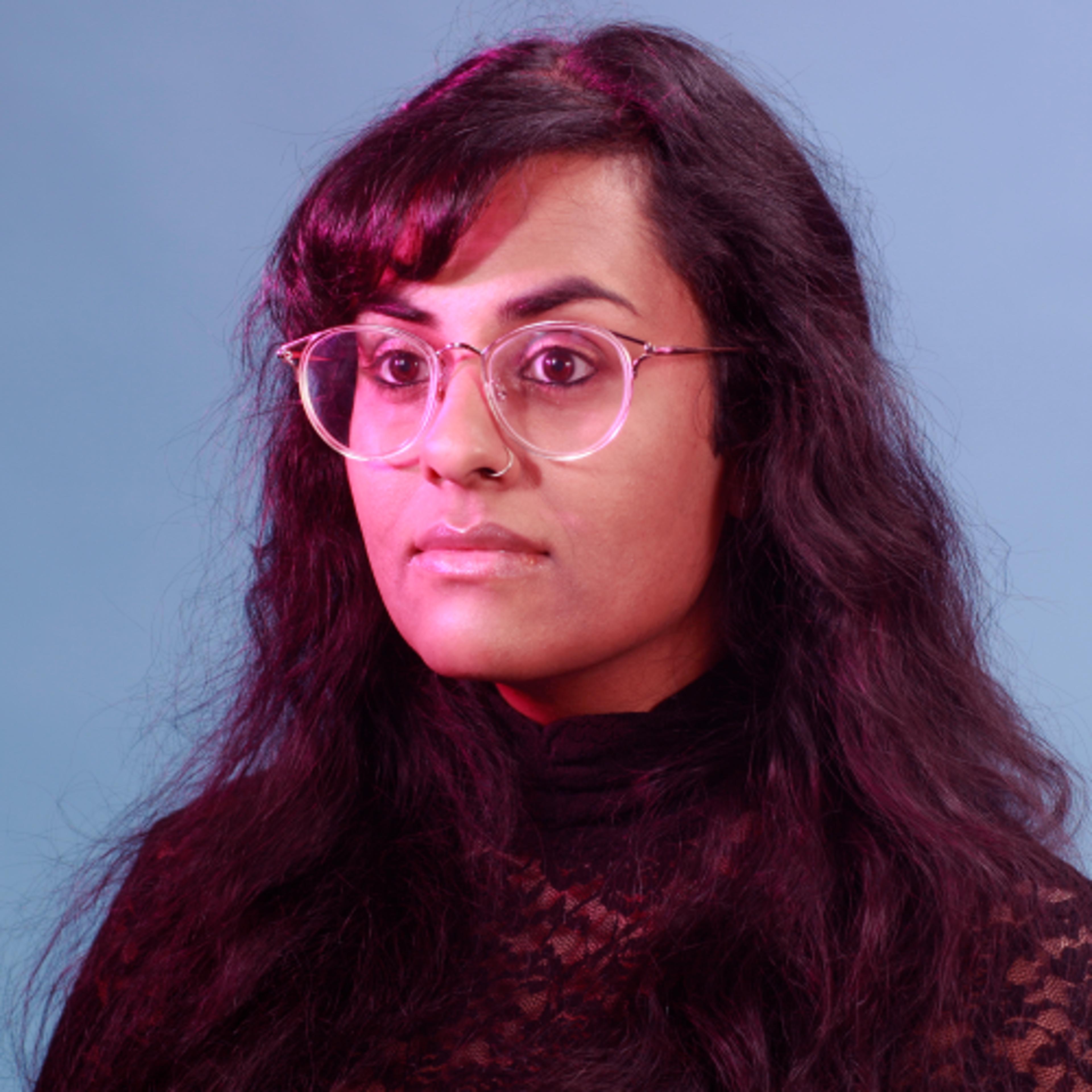 headshot of Roopa Vasudevan