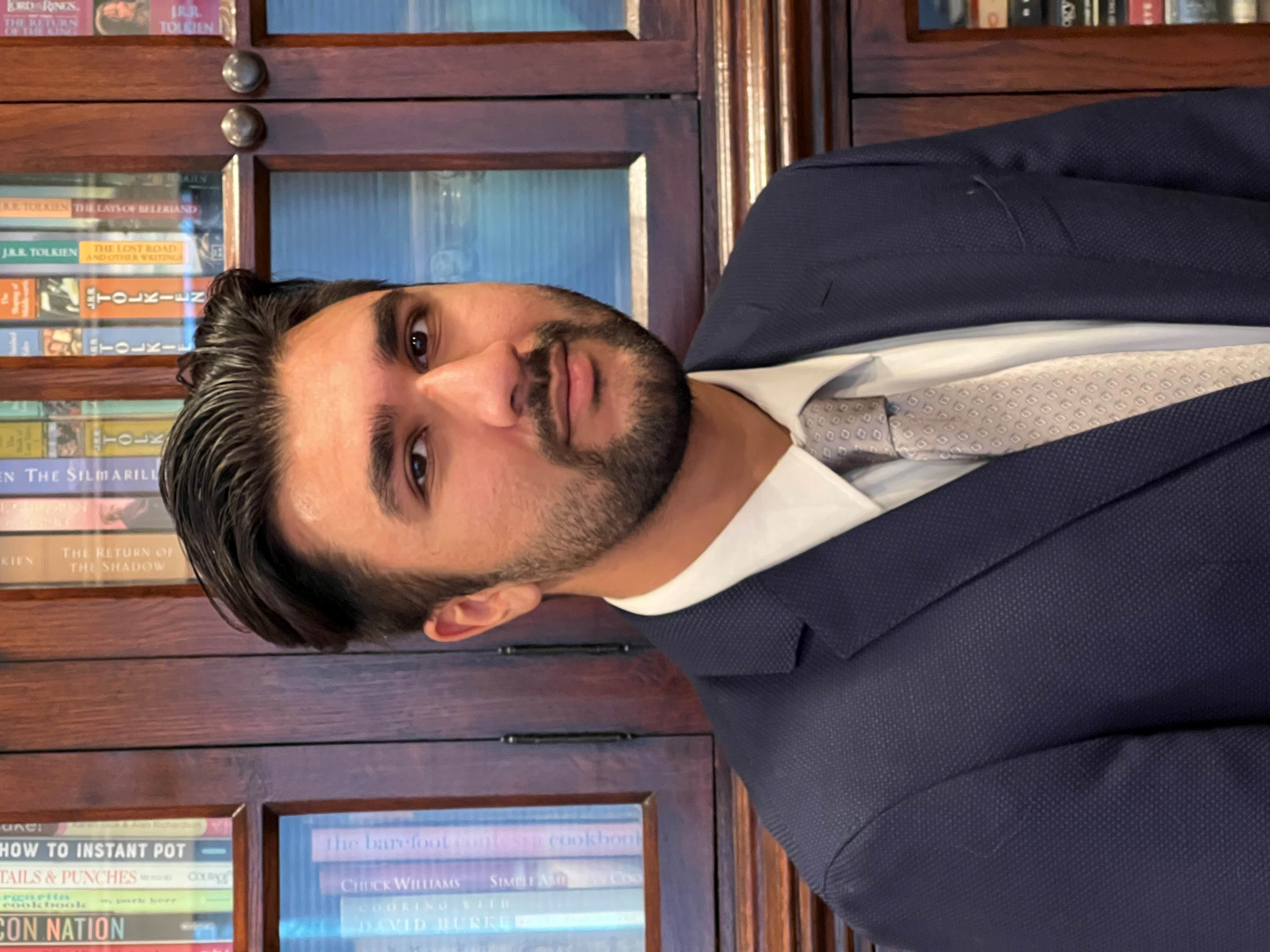 headshot of Omkaar Acharya