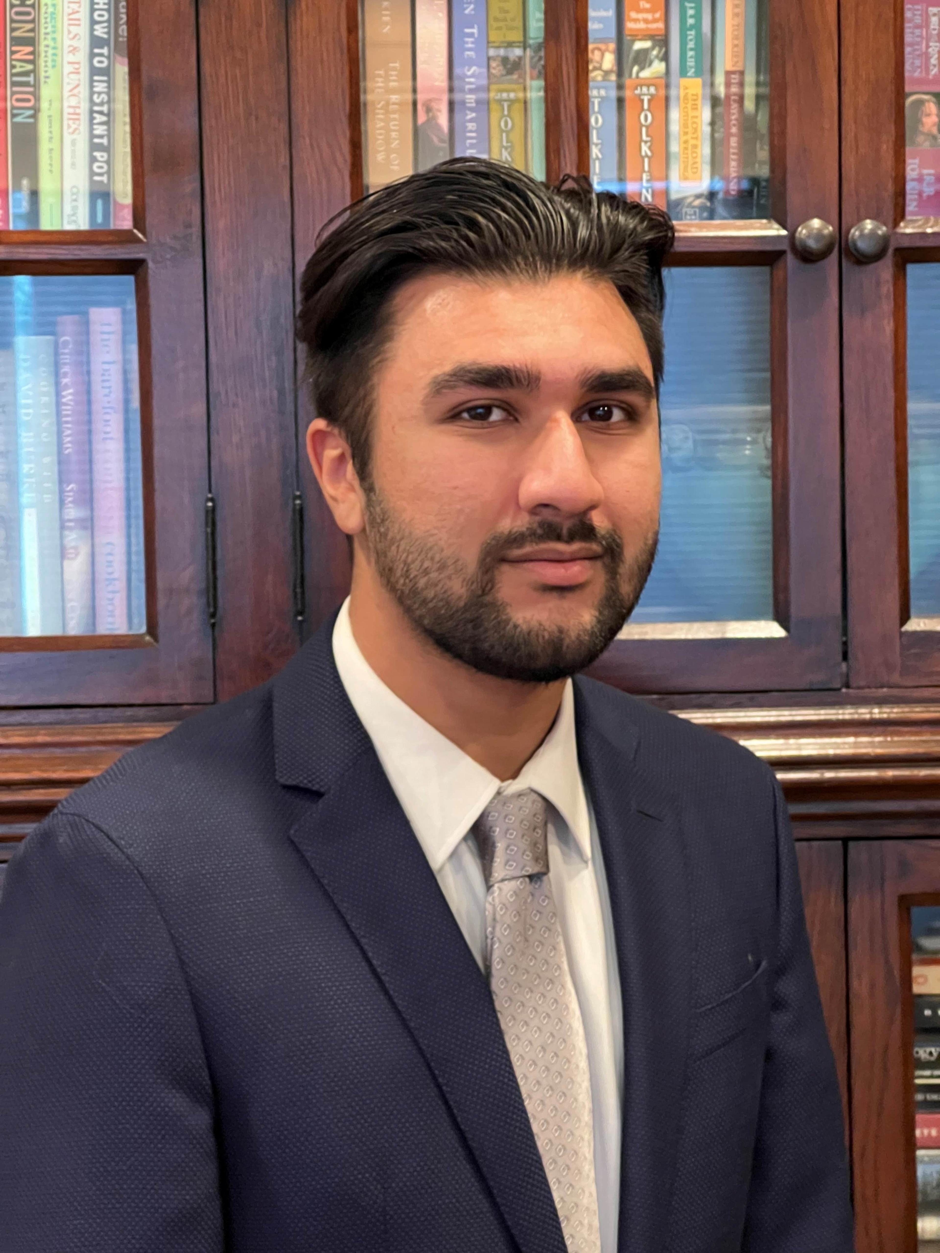 headshot of Omkaar Acharya