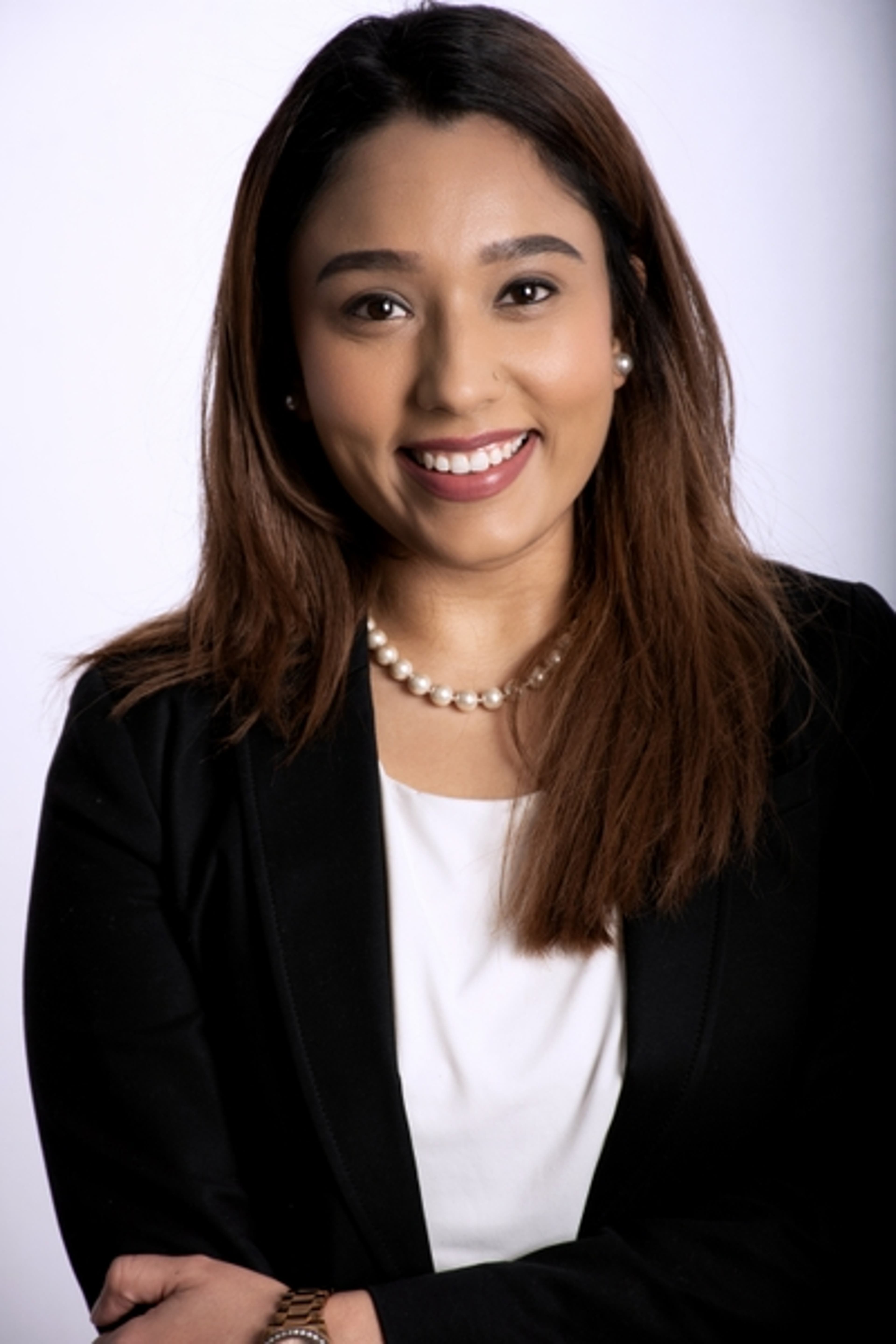 headshot of Preeti Dhawan