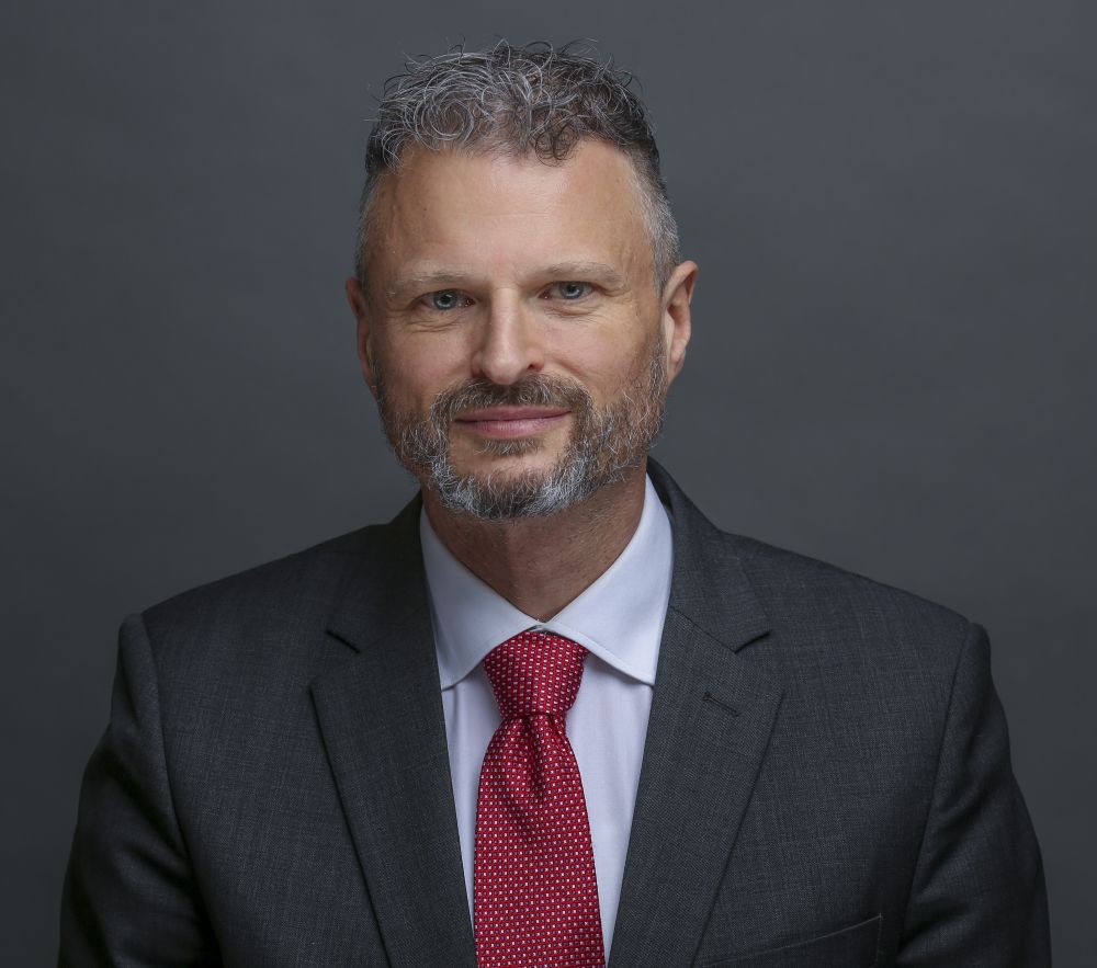 headshot of Marc Chénier