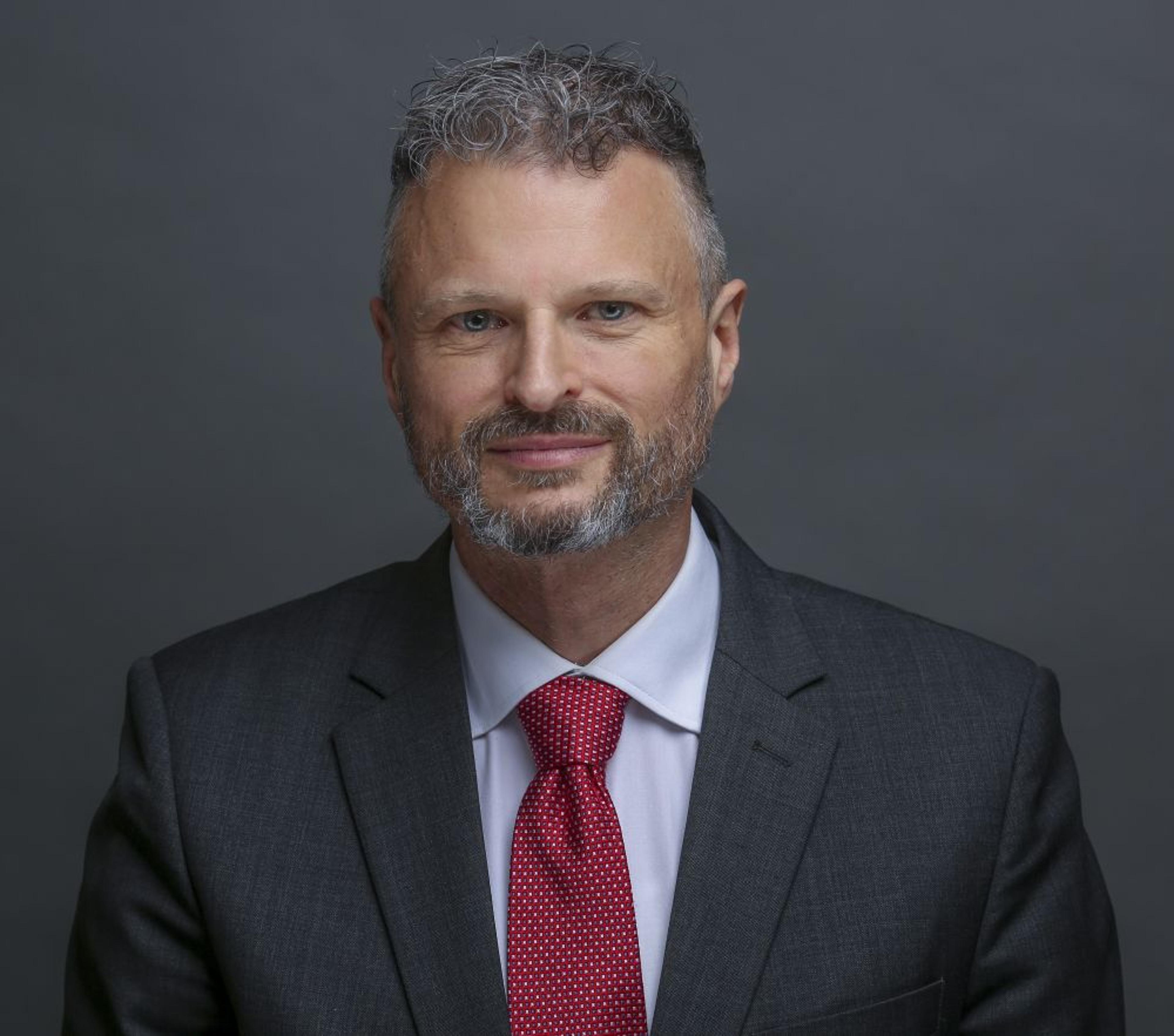 headshot of Marc Chénier