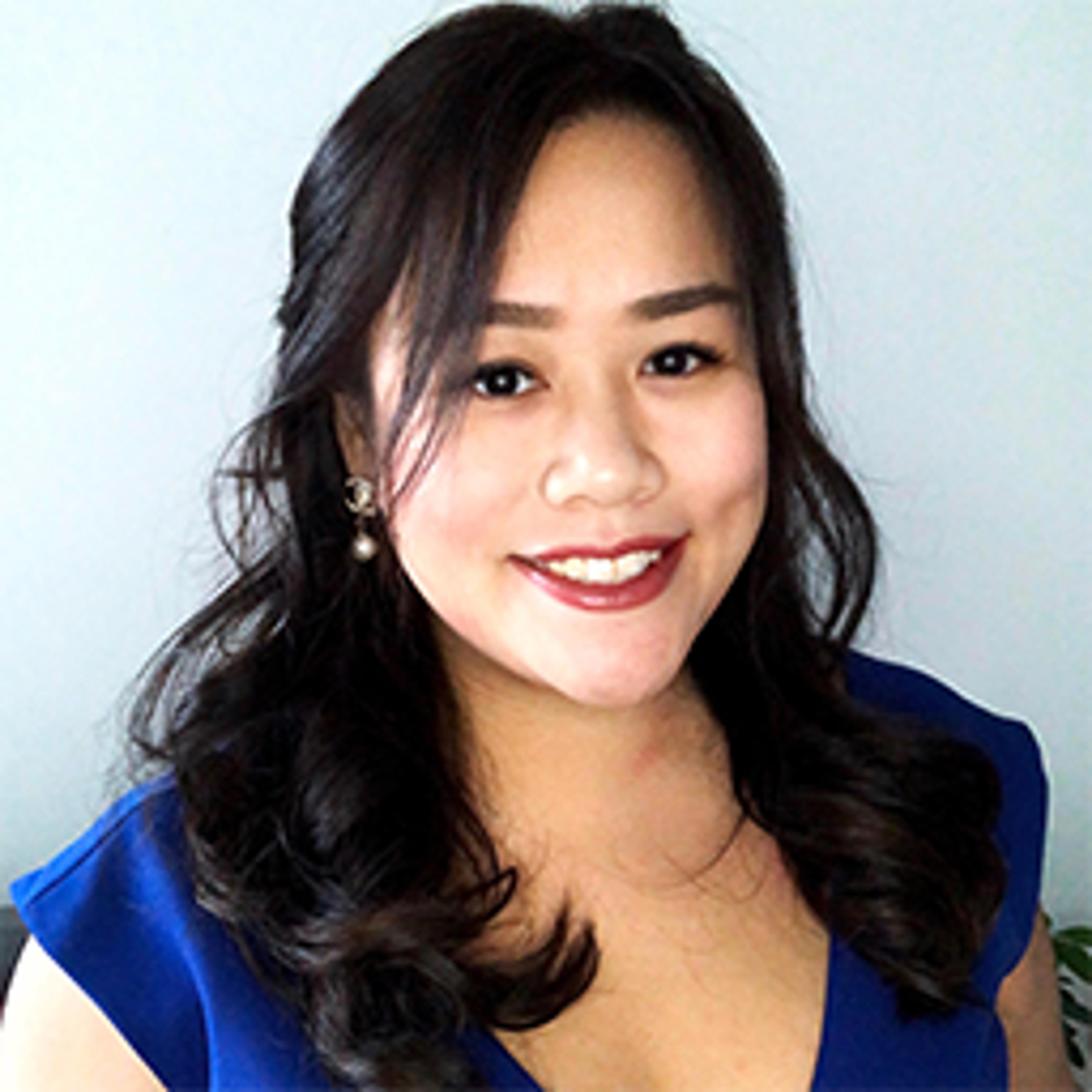 headshot of Claire Tan