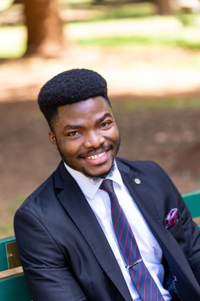 headshot of Collins OKOH