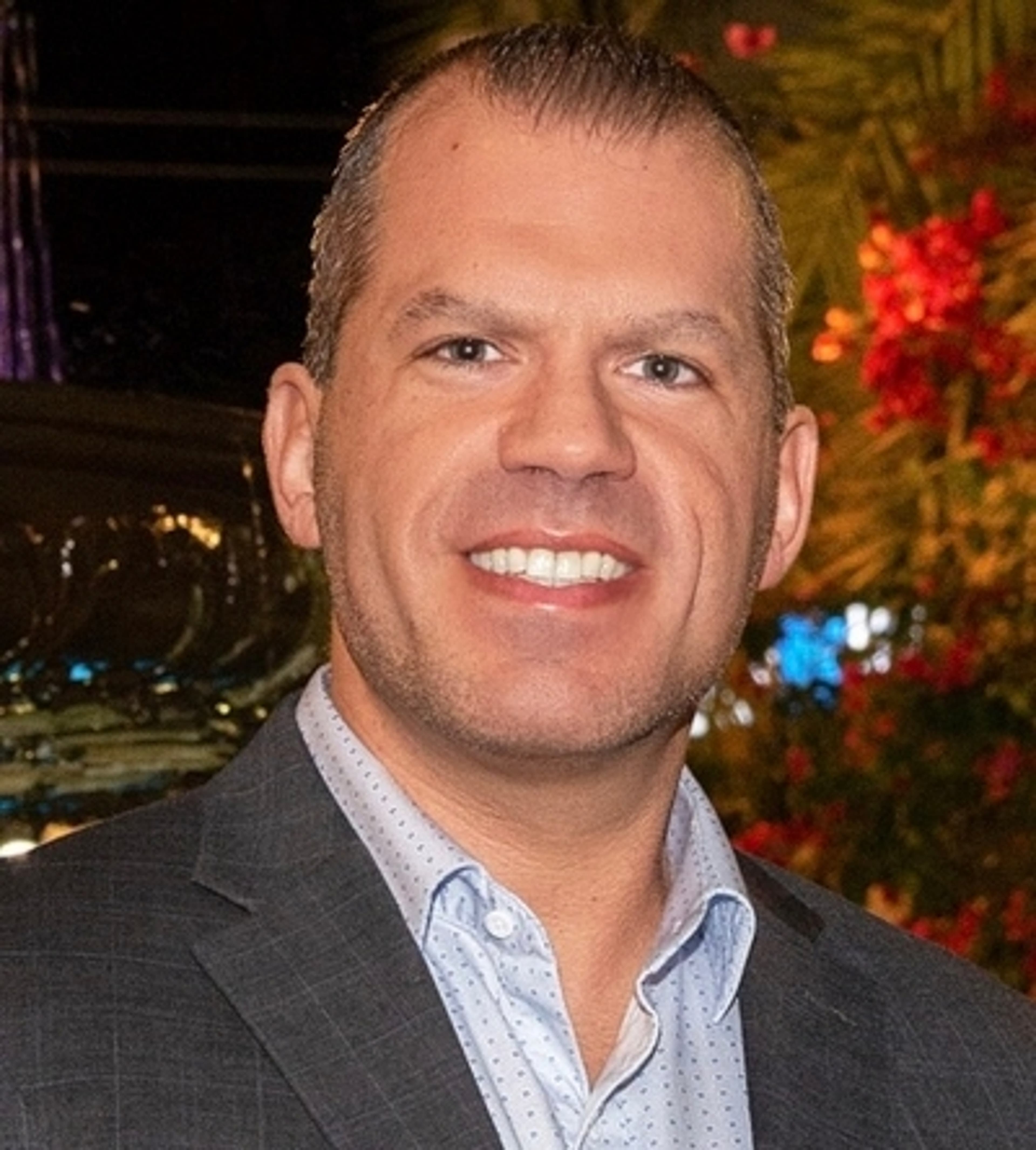 headshot of Corey Dennis