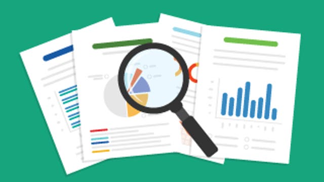 Magnifying glass over documents with charts and graphs, representing analysis and review.
