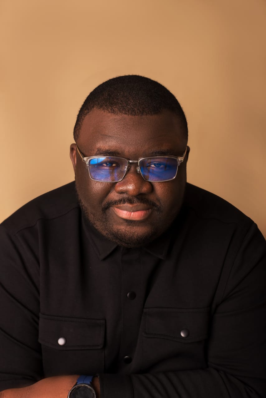 headshot of Ayodeji Sarumi