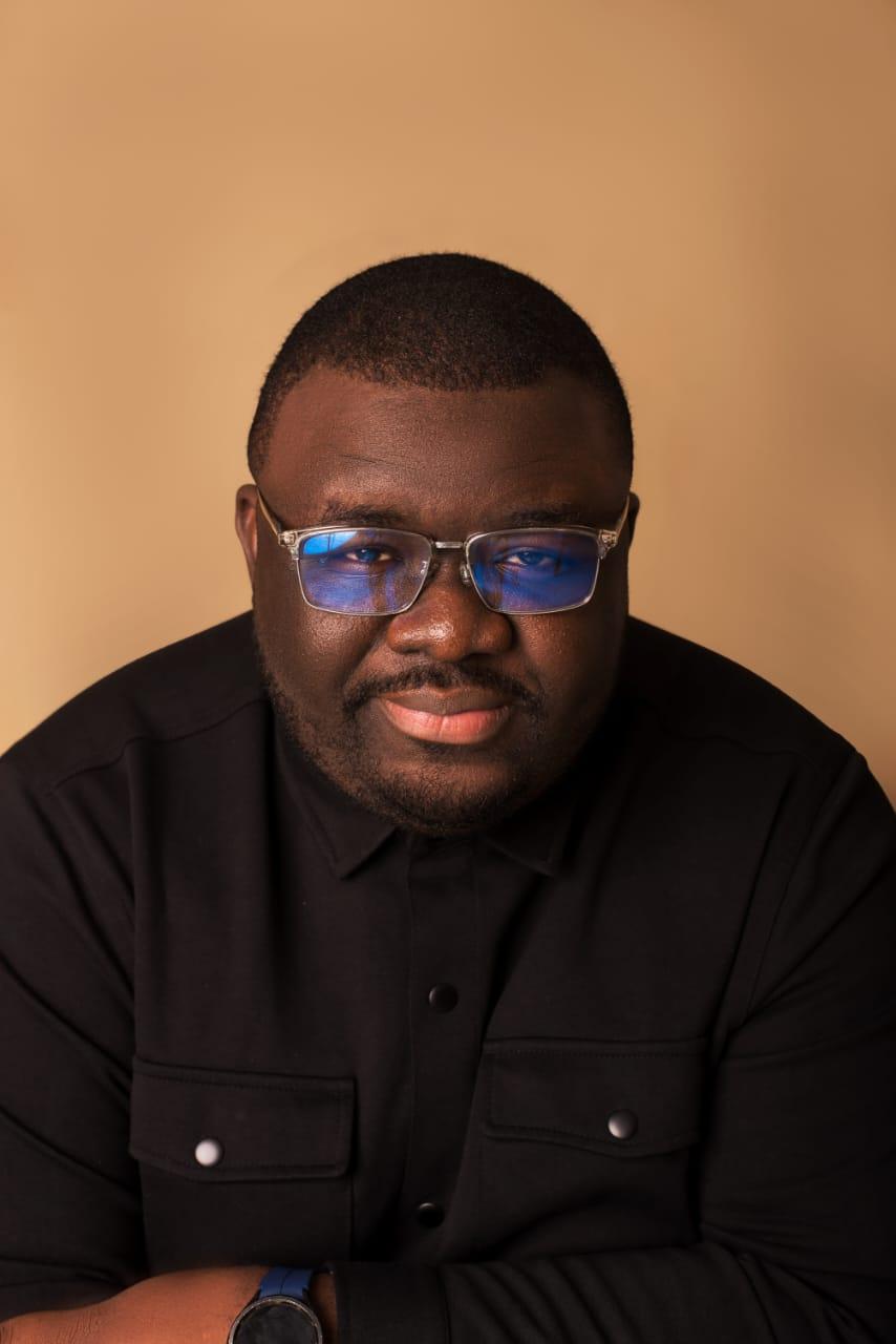 headshot of Ayodeji Sarumi