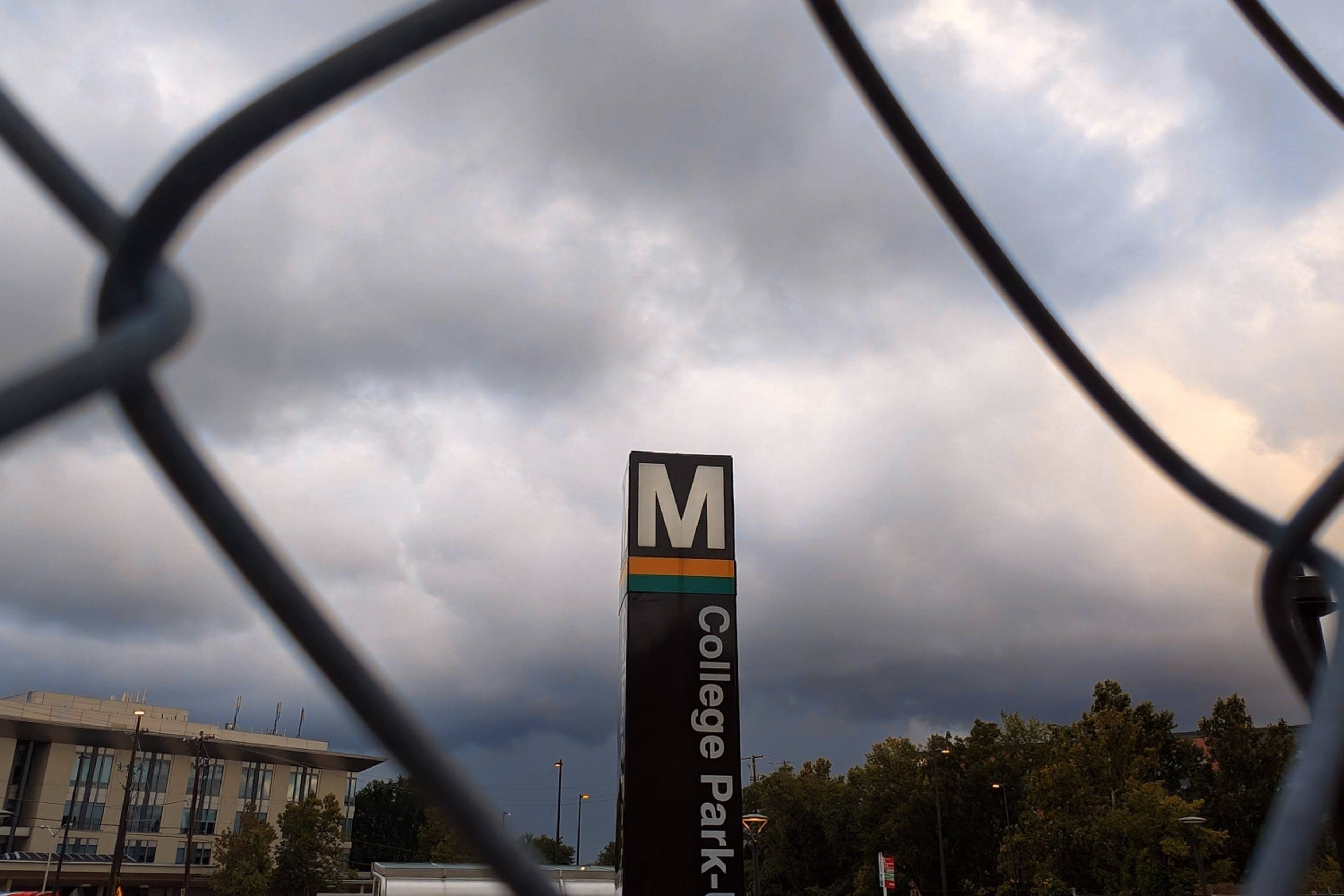 sign-through-fence-cobunzweifelkeegan-DC View-8.9.24.jpg