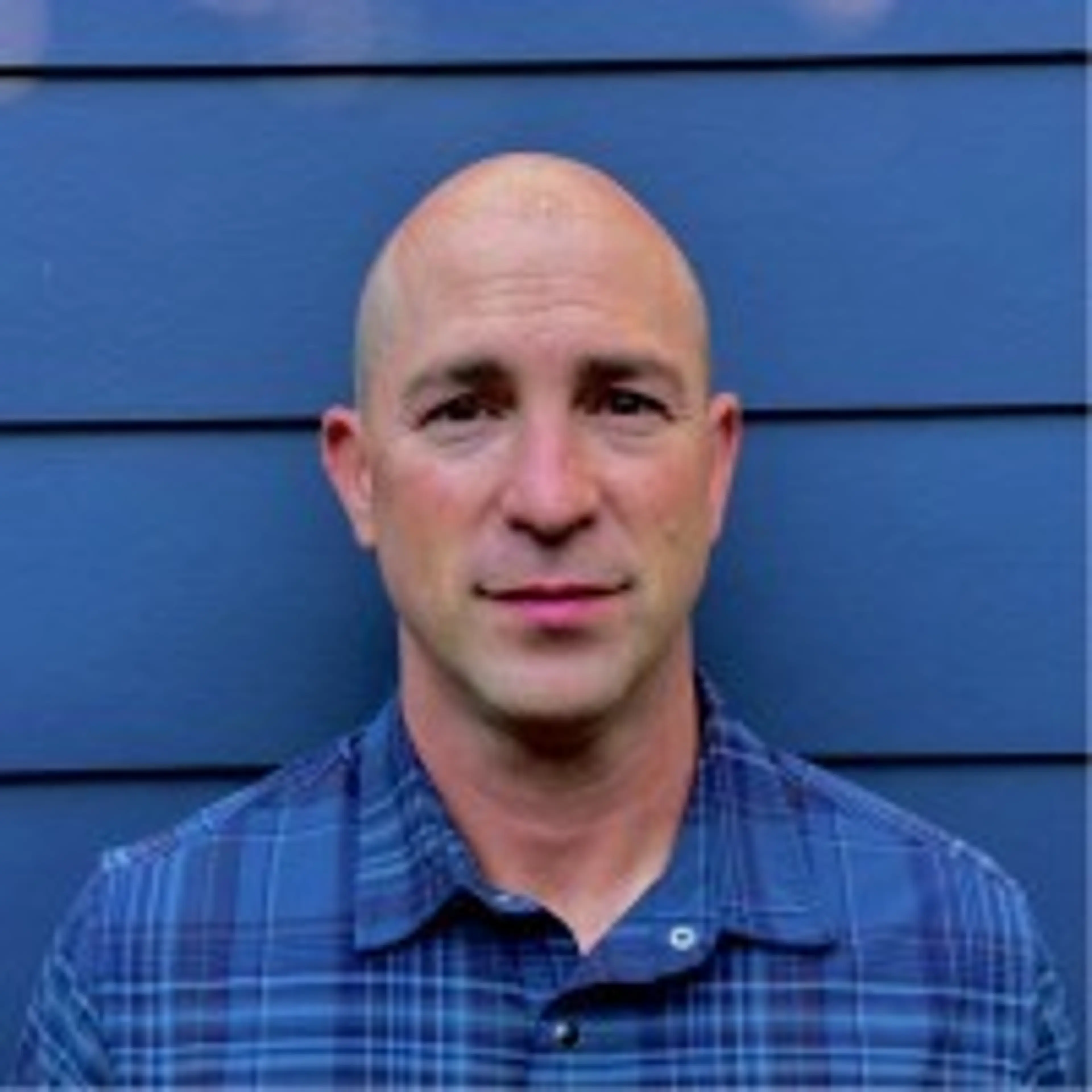 headshot of Justin Okun