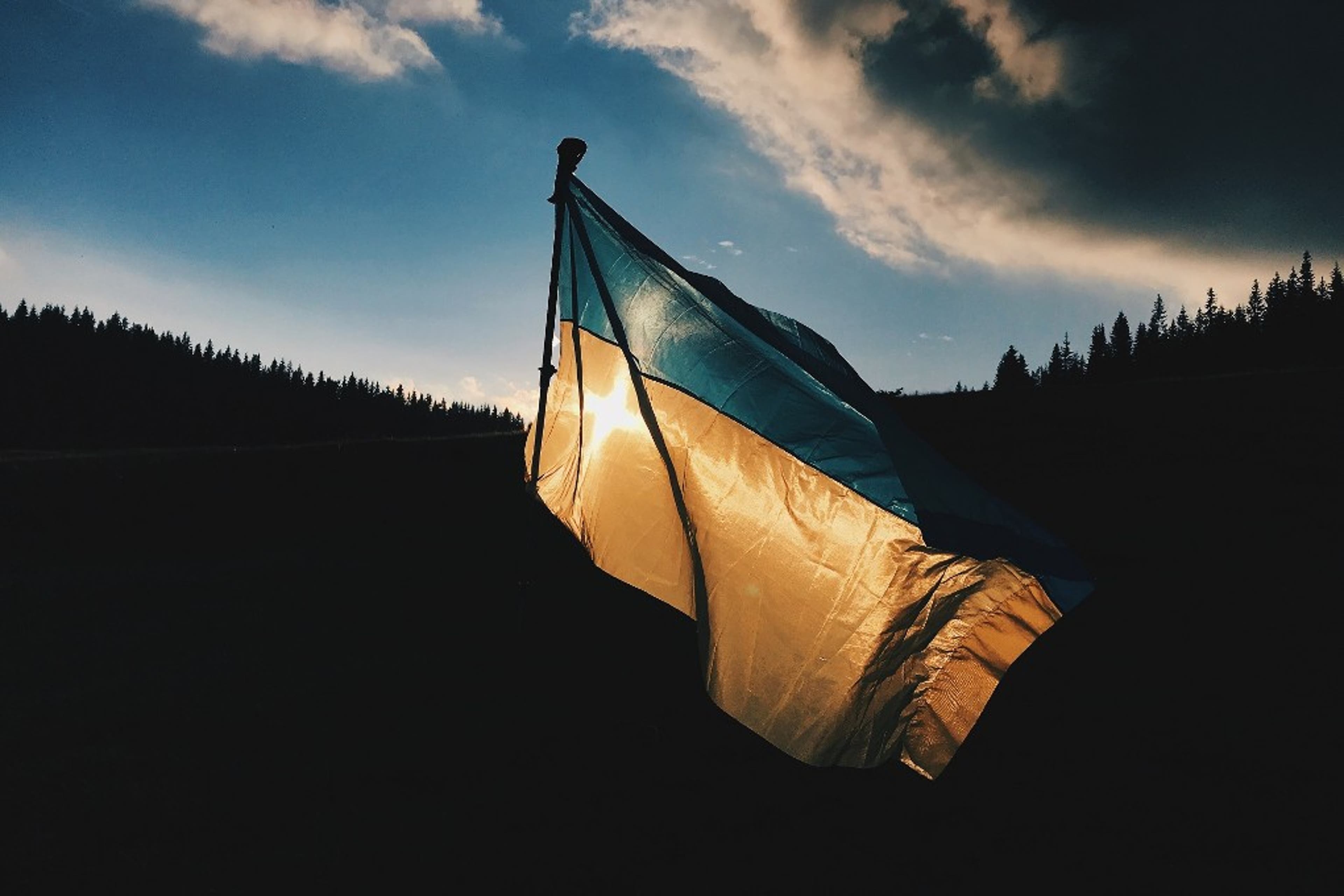 Ukraine-flag-dark-sun-europe.jpg