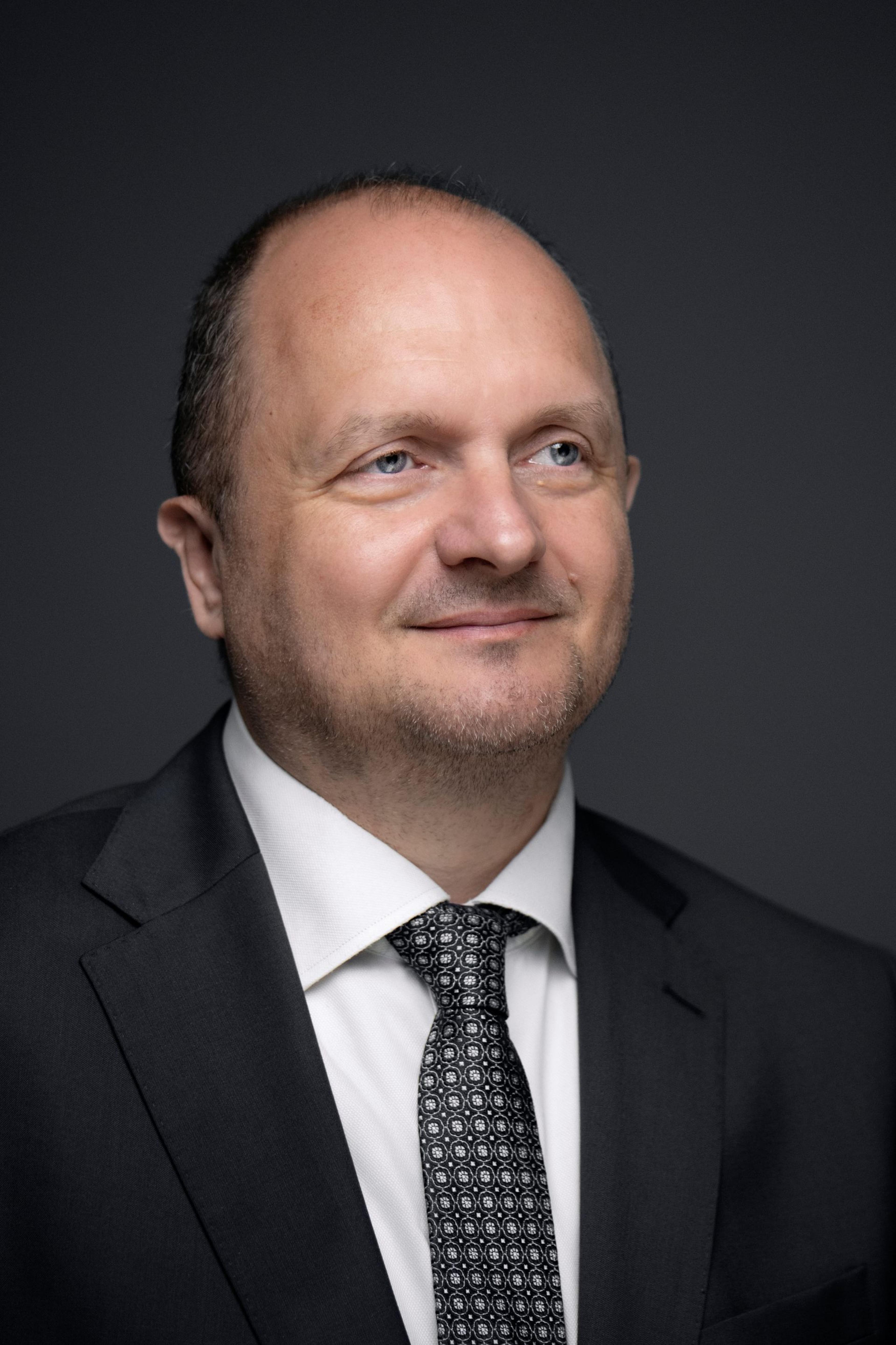 headshot of Alain Herrmann